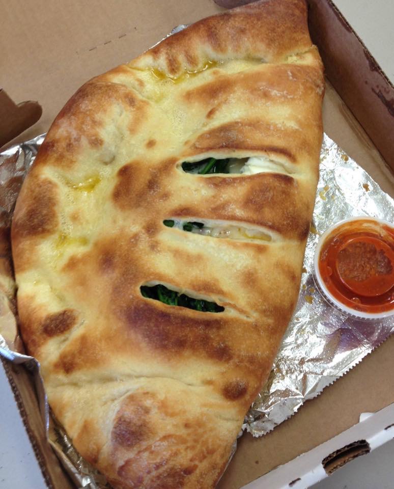 Order Calzone food online from Rhino's Pizzeria store, Webster on bringmethat.com