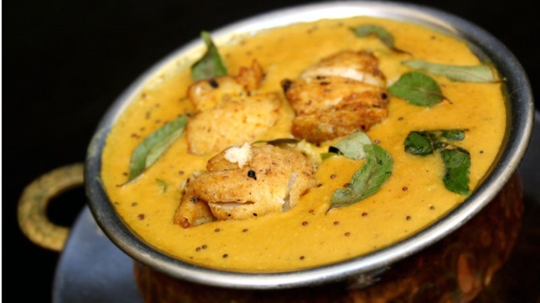 Order Coconut Fish Curry food online from Ajanta Express store, New York on bringmethat.com