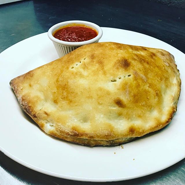 Order Calzone with Broccoli food online from Nino's Pizza & Restaurant store, Hillsdale on bringmethat.com