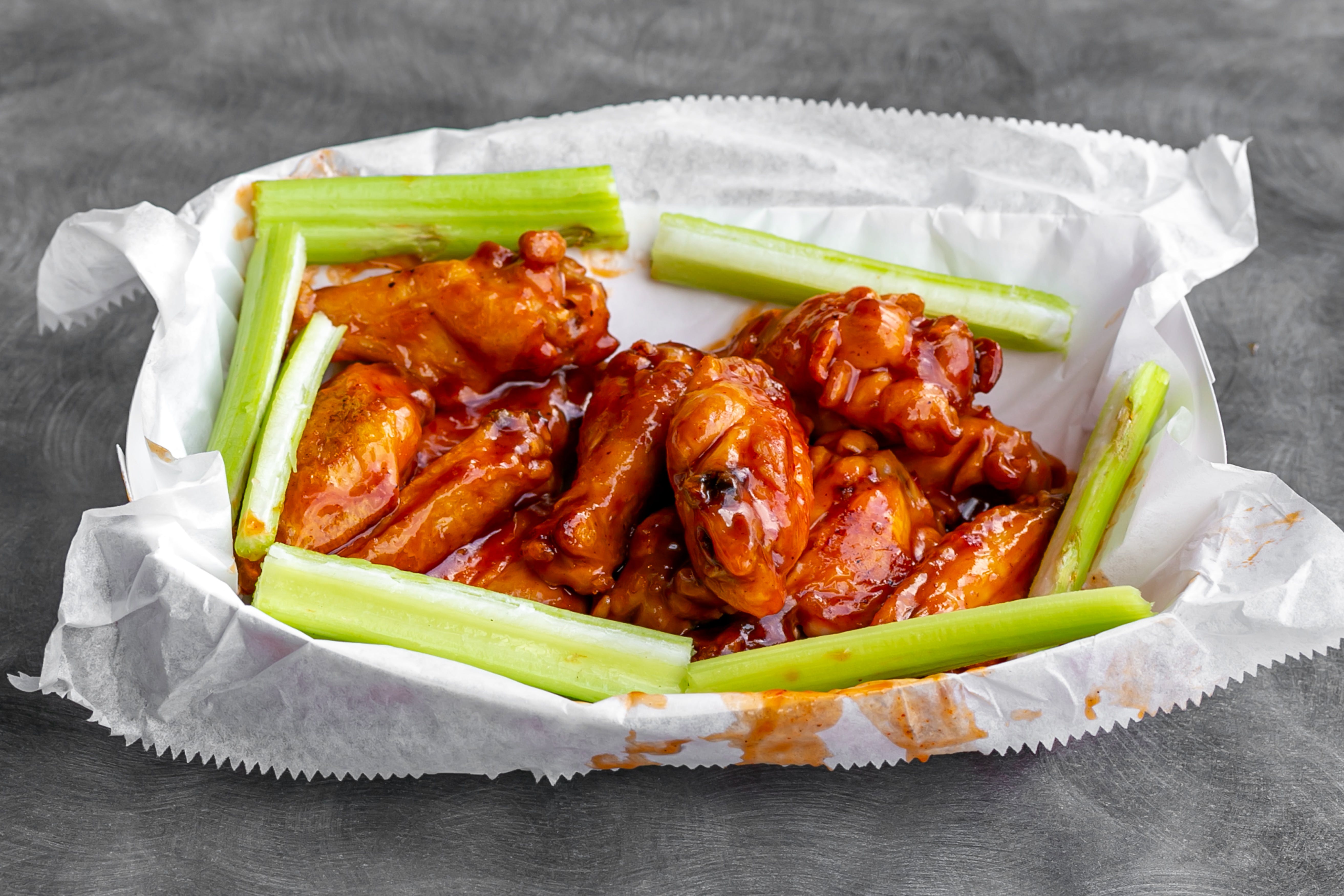 Order Bone In Jumbo Wings - Small (6 Pieces) food online from Luna Pizza Kitchen store, Dublin on bringmethat.com