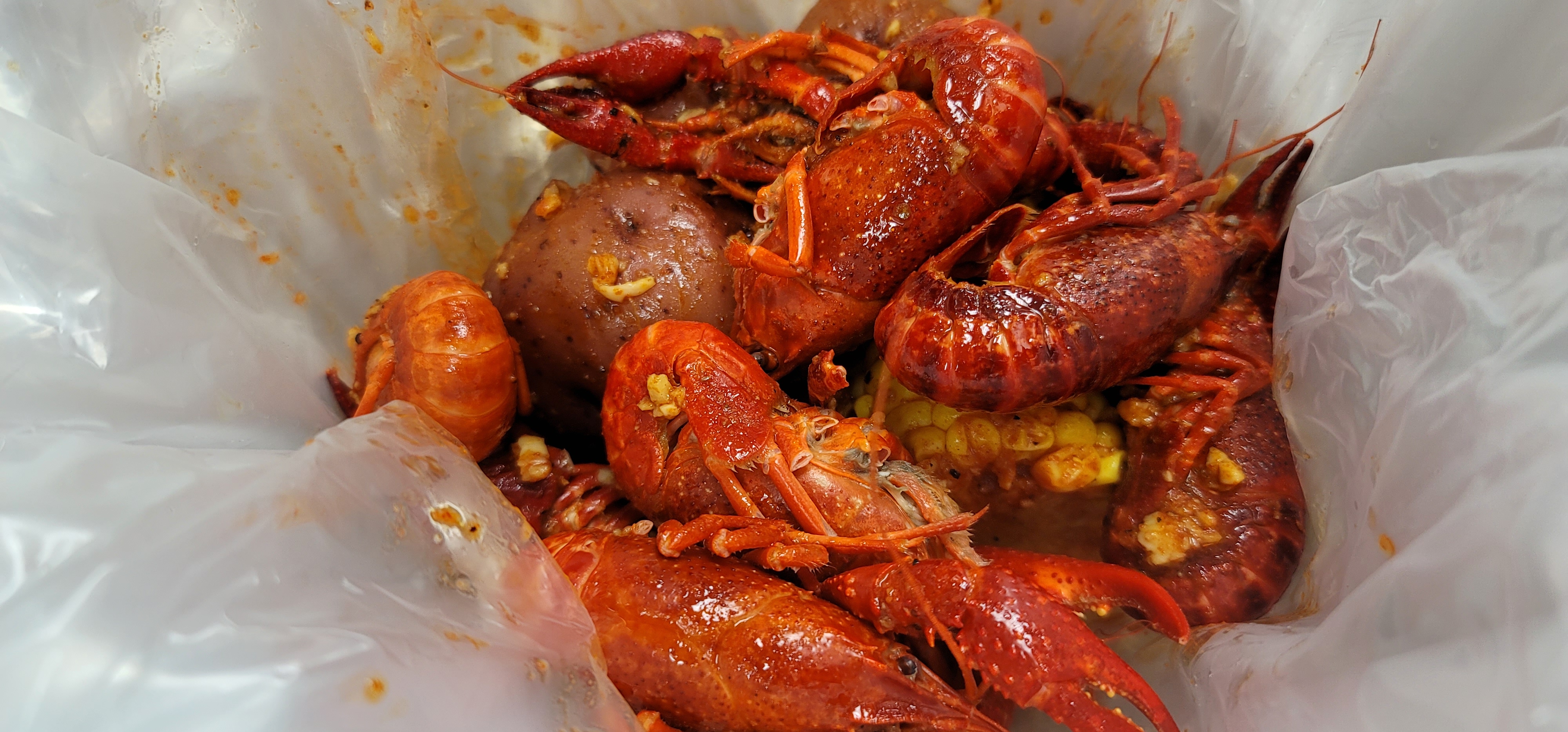 Order Craw Fish 1/2Lb food online from La Juicy Seafood store, St. Louis on bringmethat.com