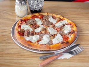 Order 12'' Meat Lovers Pizza food online from Pasta Party store, Orange on bringmethat.com
