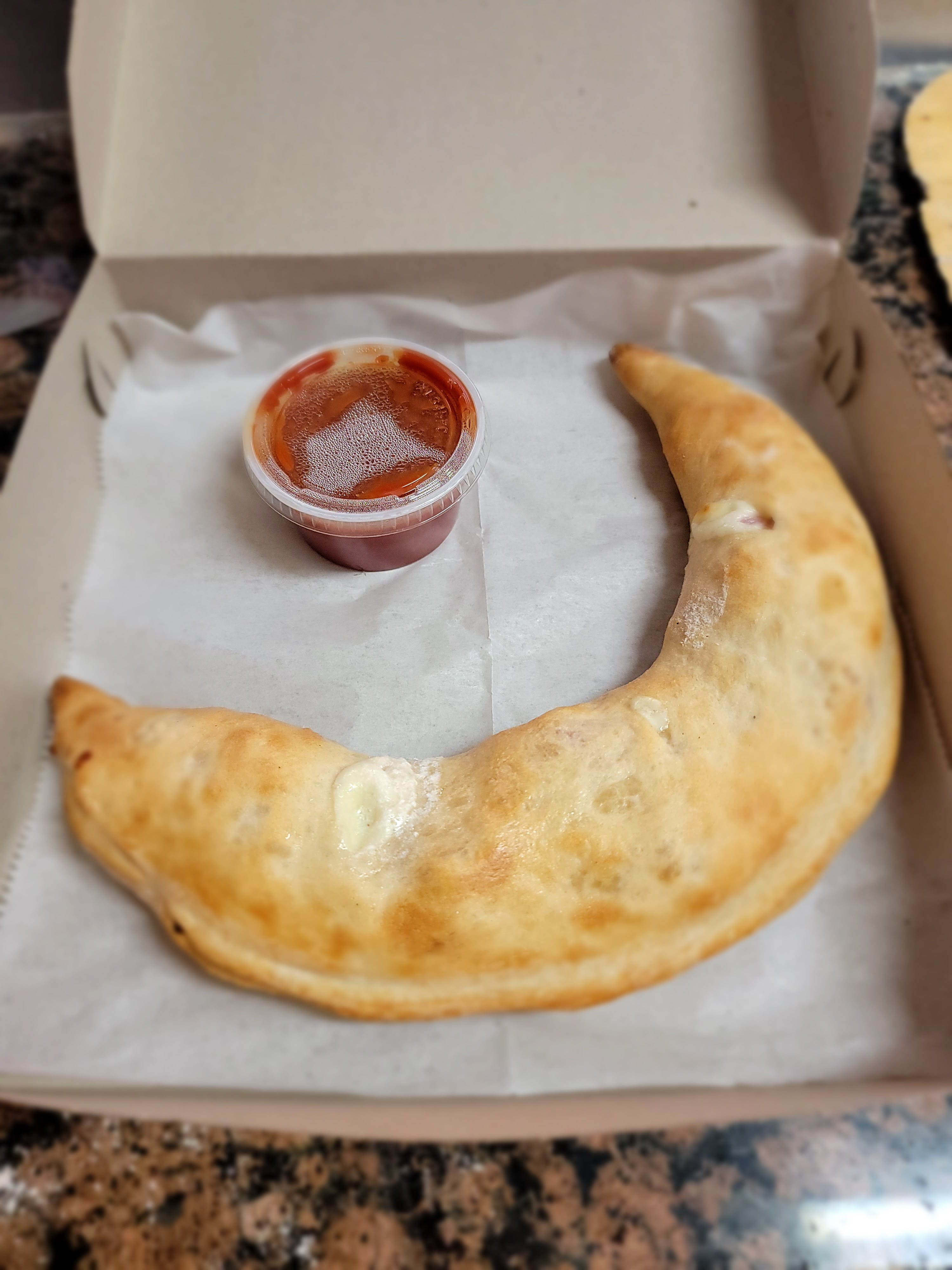 Order Ham & Cheese Calzone - Small food online from Tony Pizza store, Highspire on bringmethat.com
