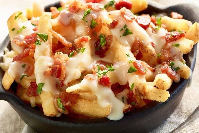 Order Loaded Cheese Fries food online from Ruby Tuesdays store, Las Cruces on bringmethat.com