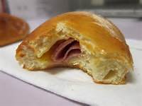 Order Ham and Cheese Kolache food online from Malenee Donuts store, La Porte on bringmethat.com