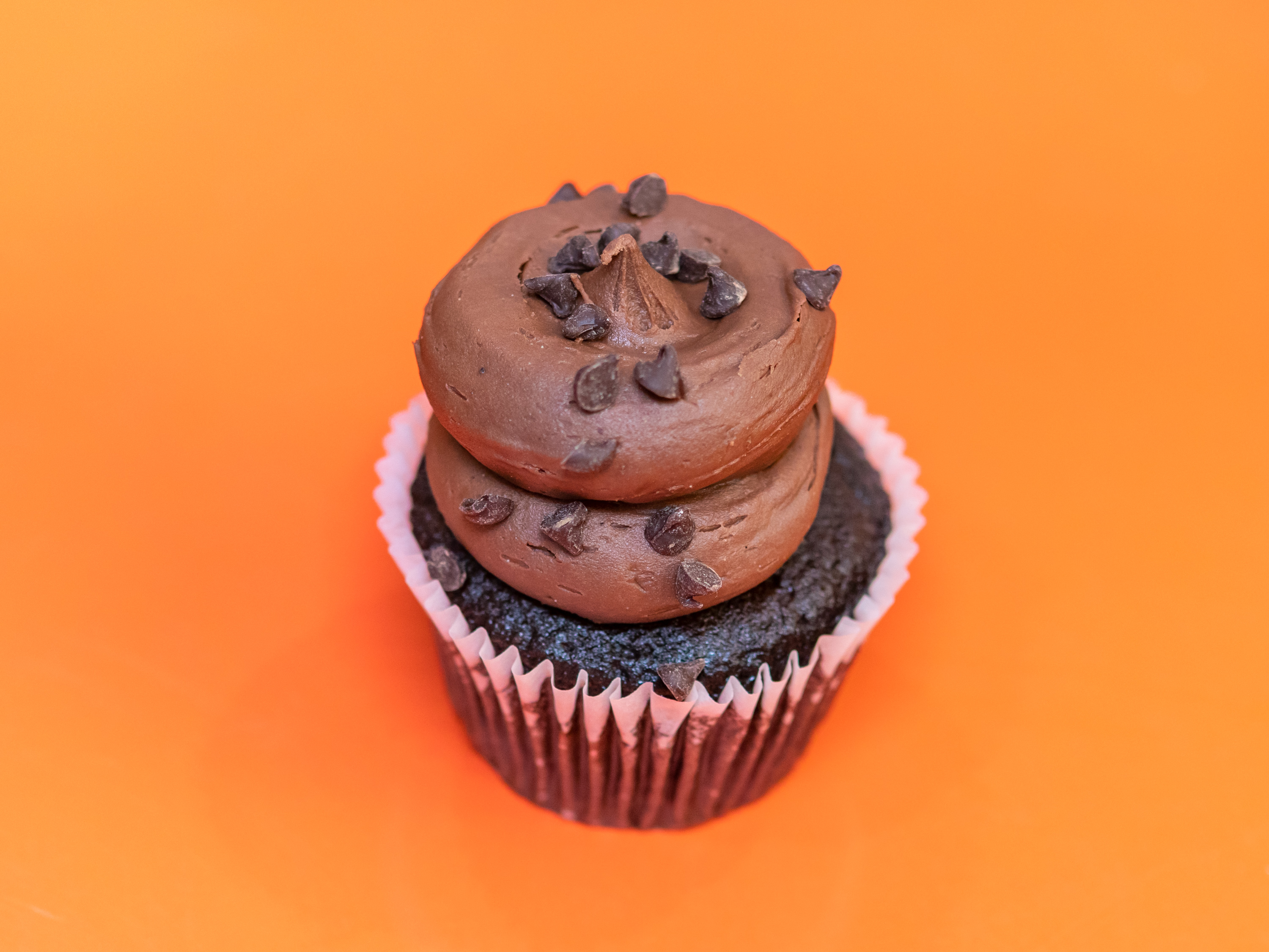 Order Midnight Magic Chocolate Chip Cupcake food online from Gigi's Cupcakes store, Omaha on bringmethat.com