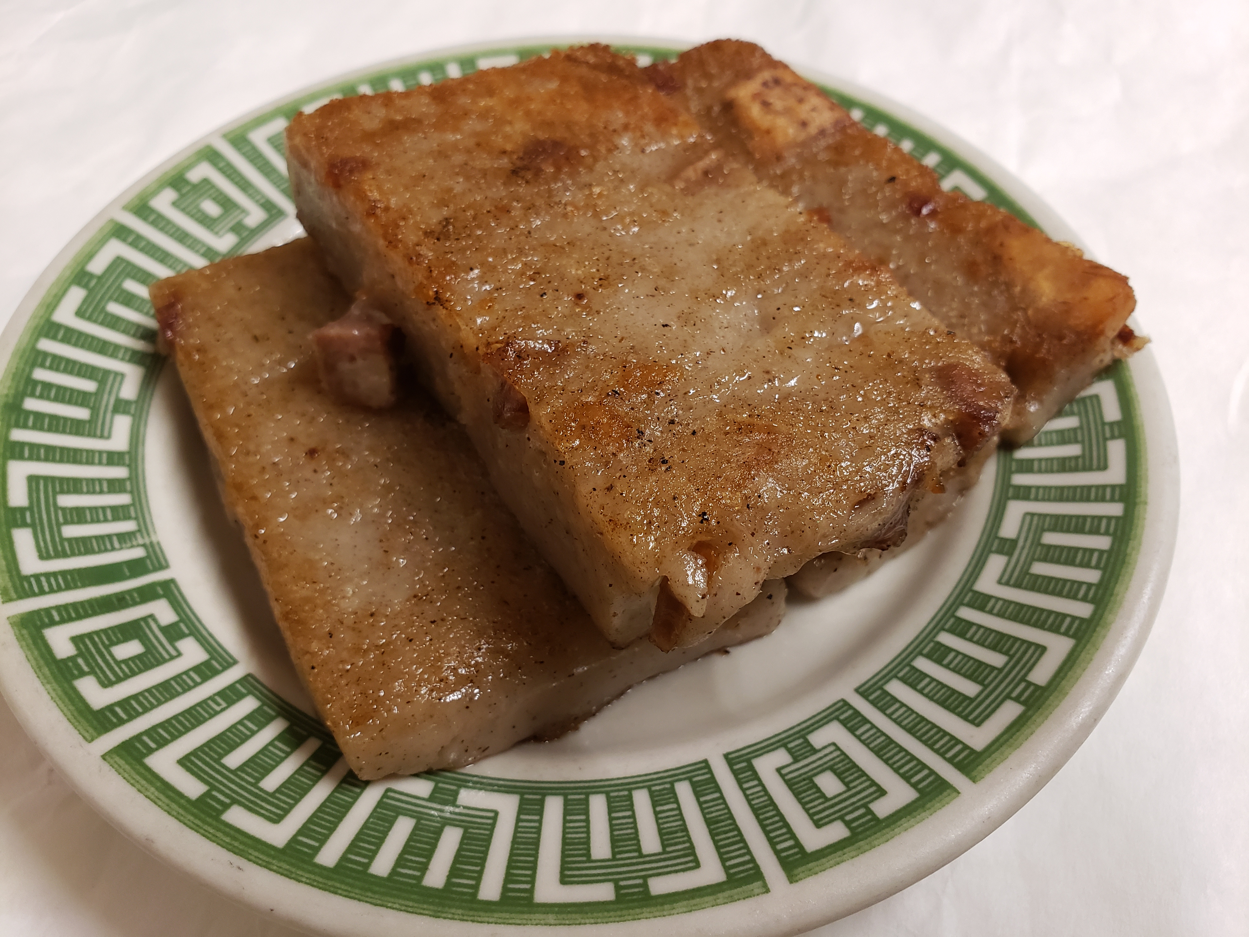 Order 50. Pan-Fried Taro Cake 煎芋头糕 food online from Jade Palace store, Louisville on bringmethat.com