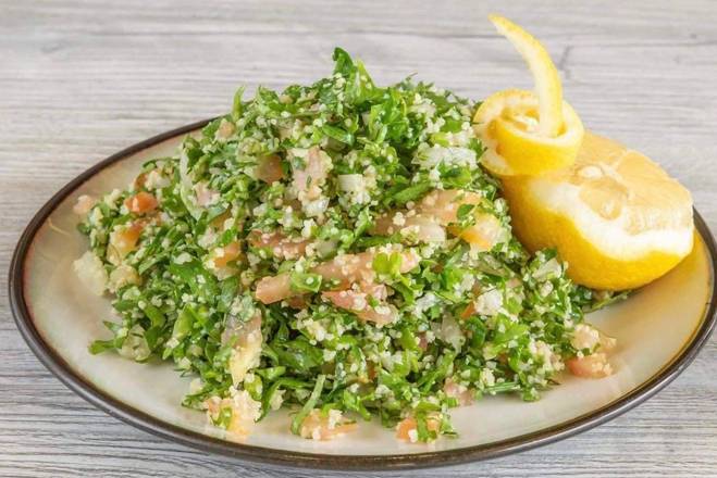 Order 24. Tabbouleh Salad food online from Pita Palace store, Franklin on bringmethat.com