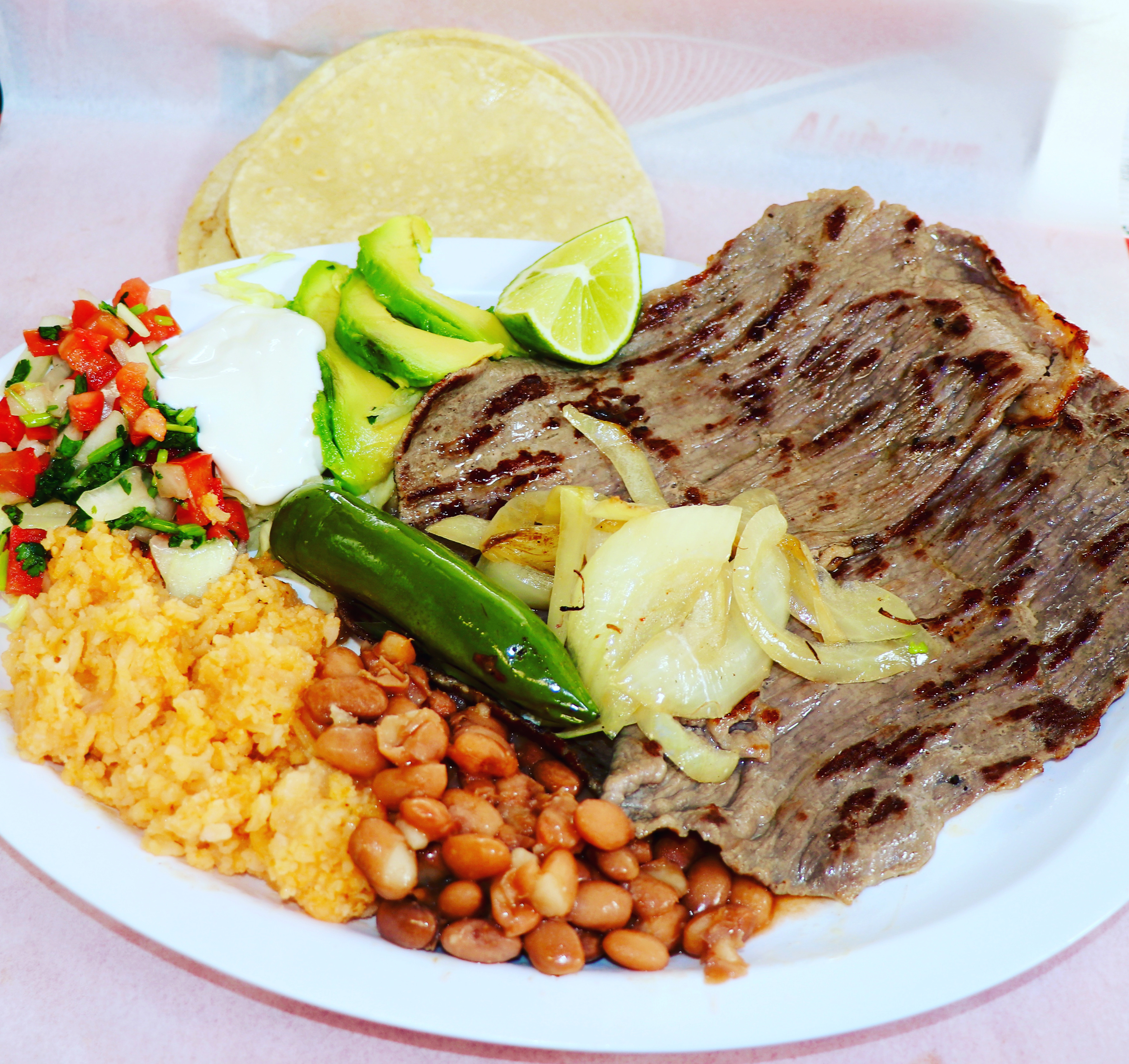 Order Carne Asada food online from Toluco Mexican Kitchen store, Palo Alto on bringmethat.com