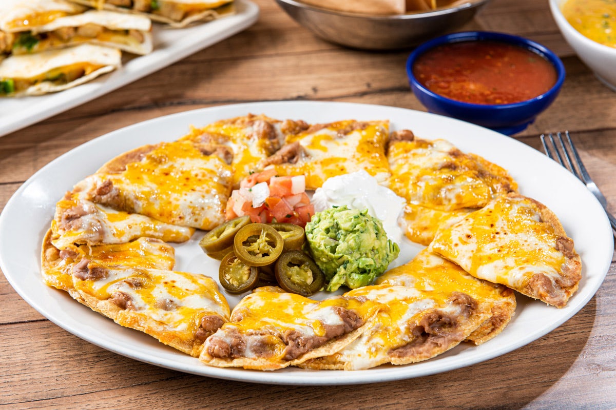 Order Grande Bean & Cheese Nachos food online from On The Border store, Columbus on bringmethat.com