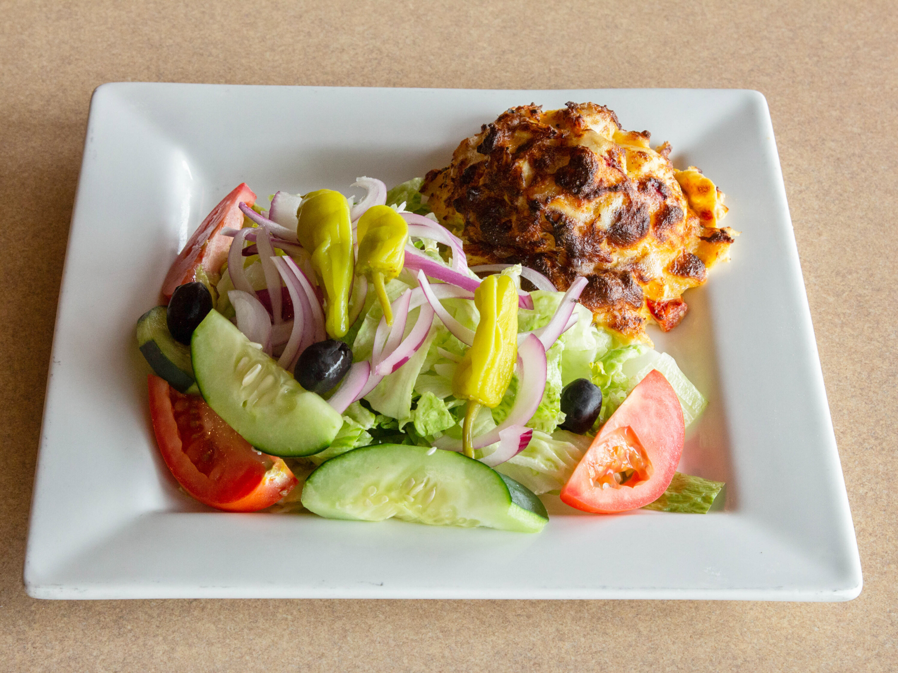 Order 9 oz. Crab Cake and Salad Special food online from Fortunato Brothers Pizza store, Edgewood on bringmethat.com