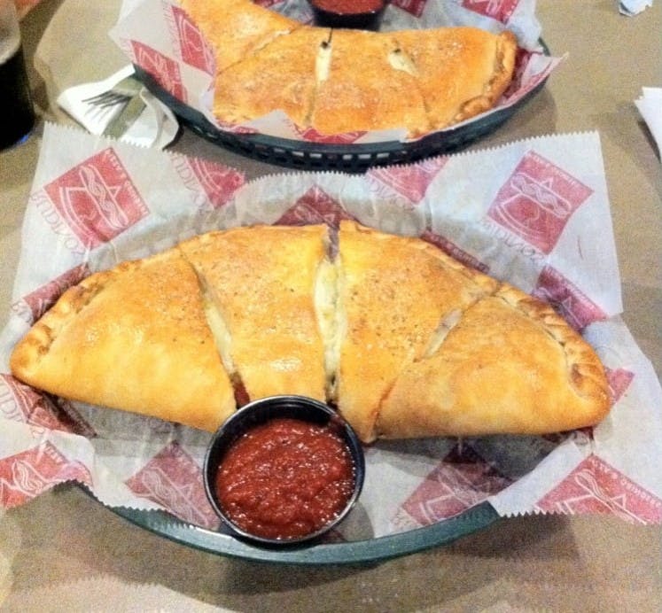 Order Calzone - Calzone food online from Rudino's Pizza & Grinders store, Knightdale on bringmethat.com