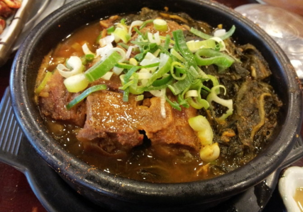 Order Pork neck bone hangover soup food online from Sisters Korean Kitchen store, Cerritos on bringmethat.com
