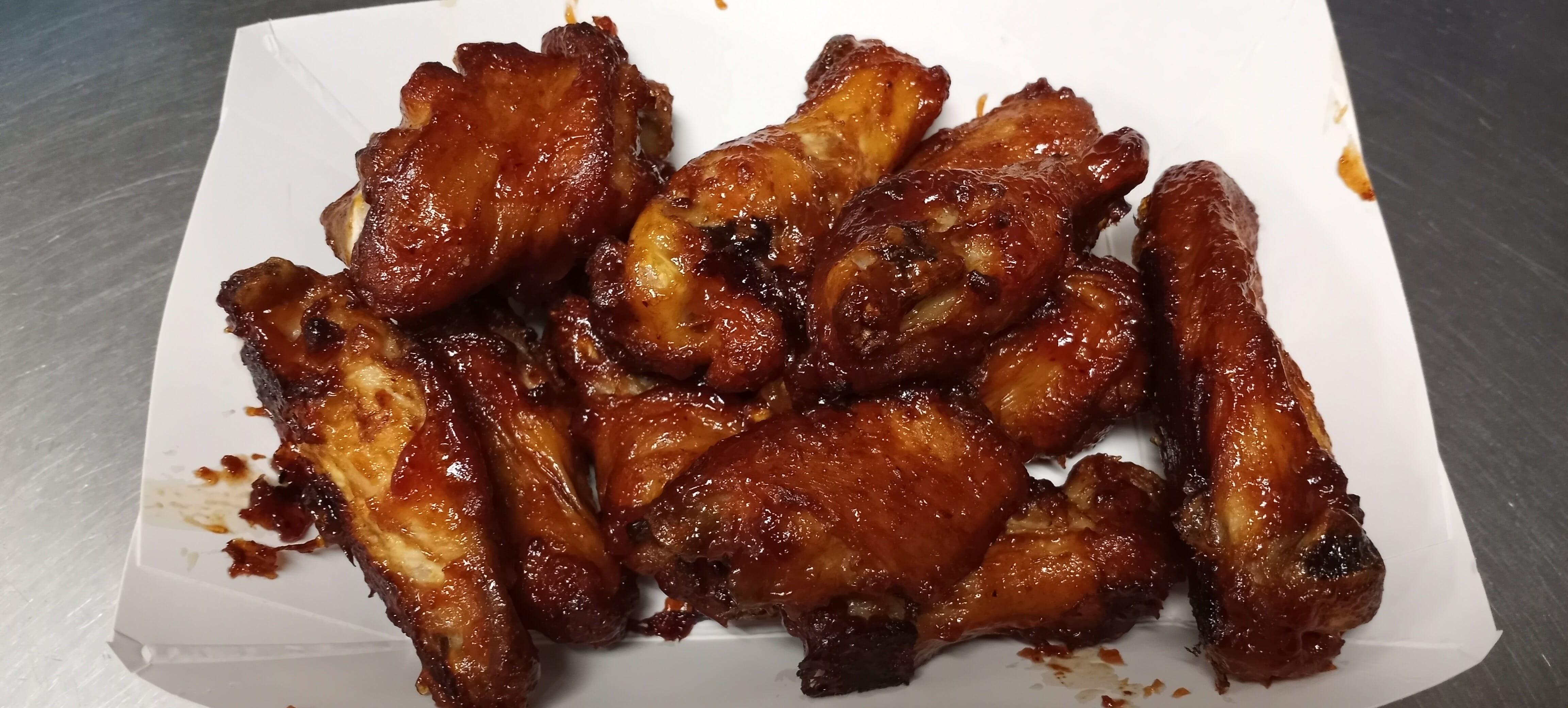 Order Chicken Wings - 6 Pieces food online from Baggi Pizza store, Delano on bringmethat.com
