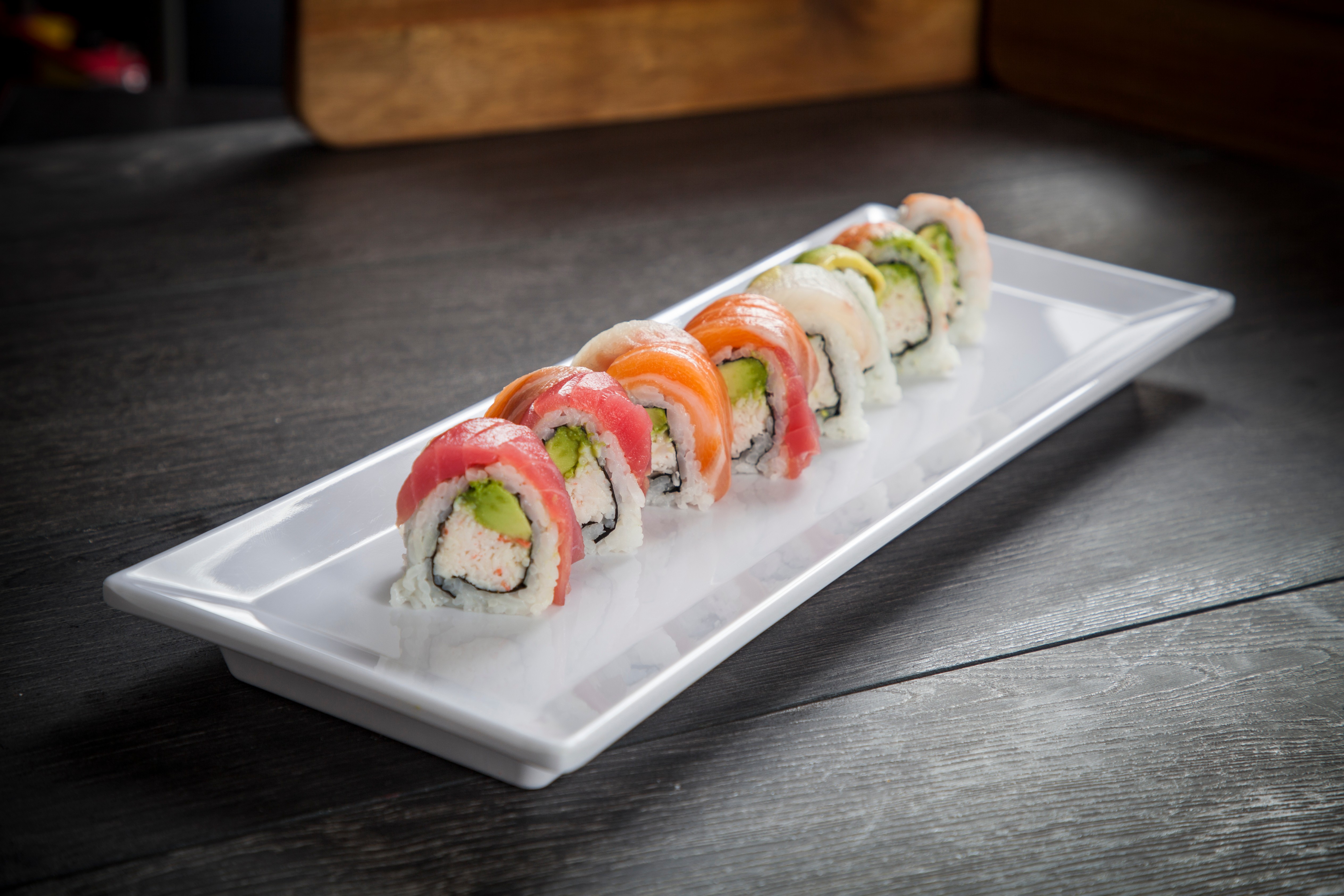 Order Rainbow Roll food online from Ozen Sushi store, Cypress on bringmethat.com