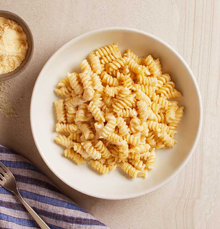 Order Kid's Fusilli Alfredo food online from California Pizza Kitchen - River City Dr store, Jacksonville on bringmethat.com