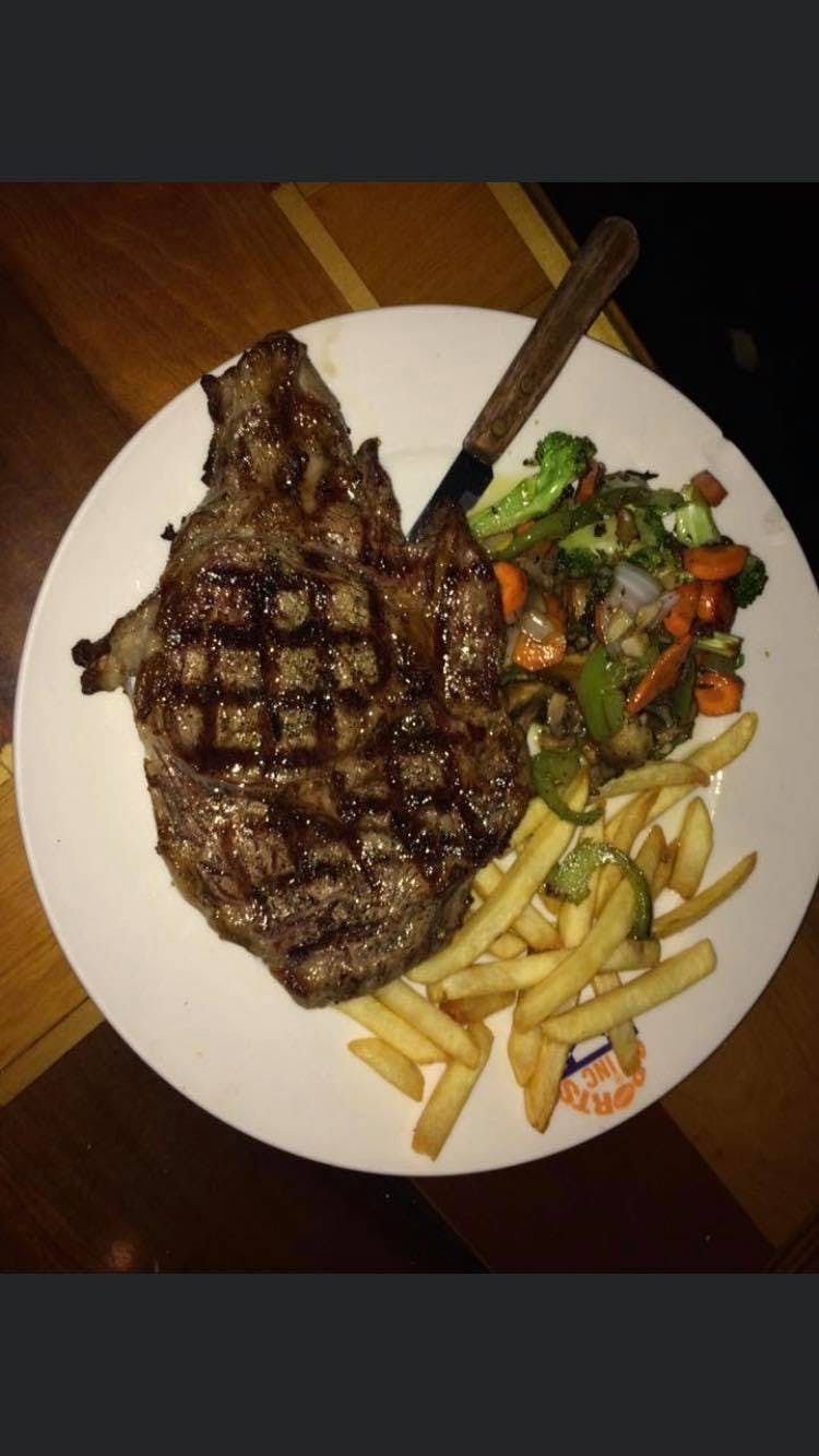 Order Grilled Ribeye - 16 oz. food online from Napoli Pizza & Restaurant store, Corsicana on bringmethat.com