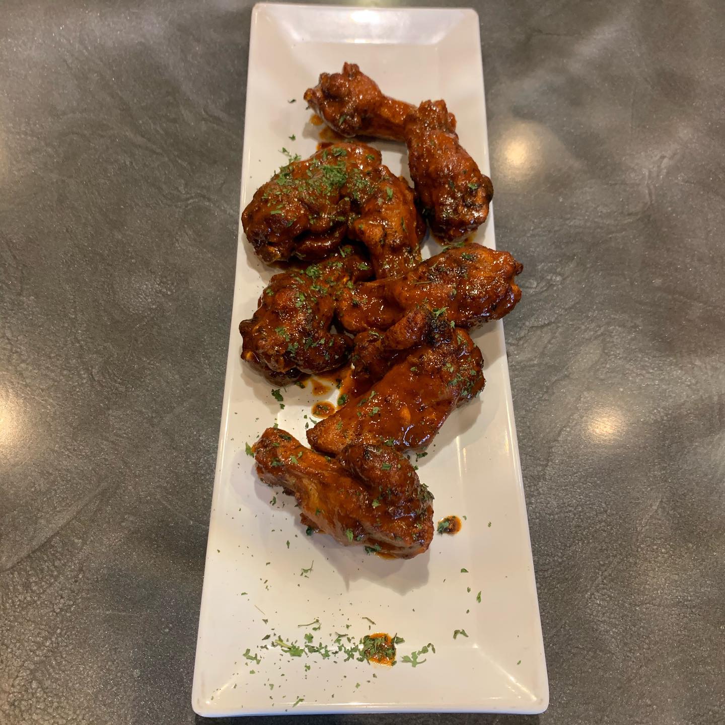 Order   12 Hennessy BBQ Wings food online from North Bar & Grille store, Southfield on bringmethat.com