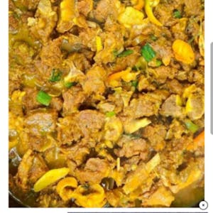 Order Jamaican Curry Goat food online from Desia Spicy Bites store, Branson on bringmethat.com