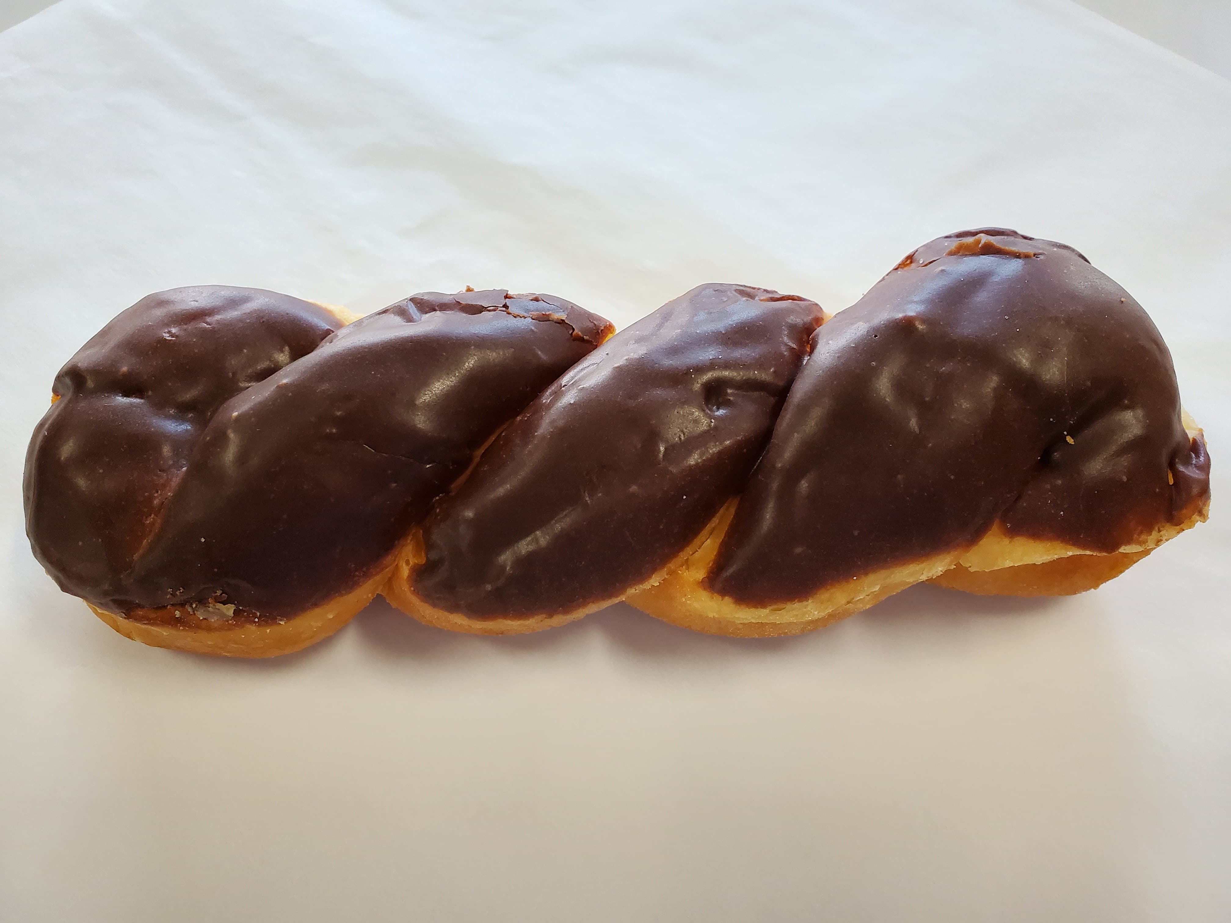 Order Chocolate Twist food online from Honey Donuts store, Crowley on bringmethat.com