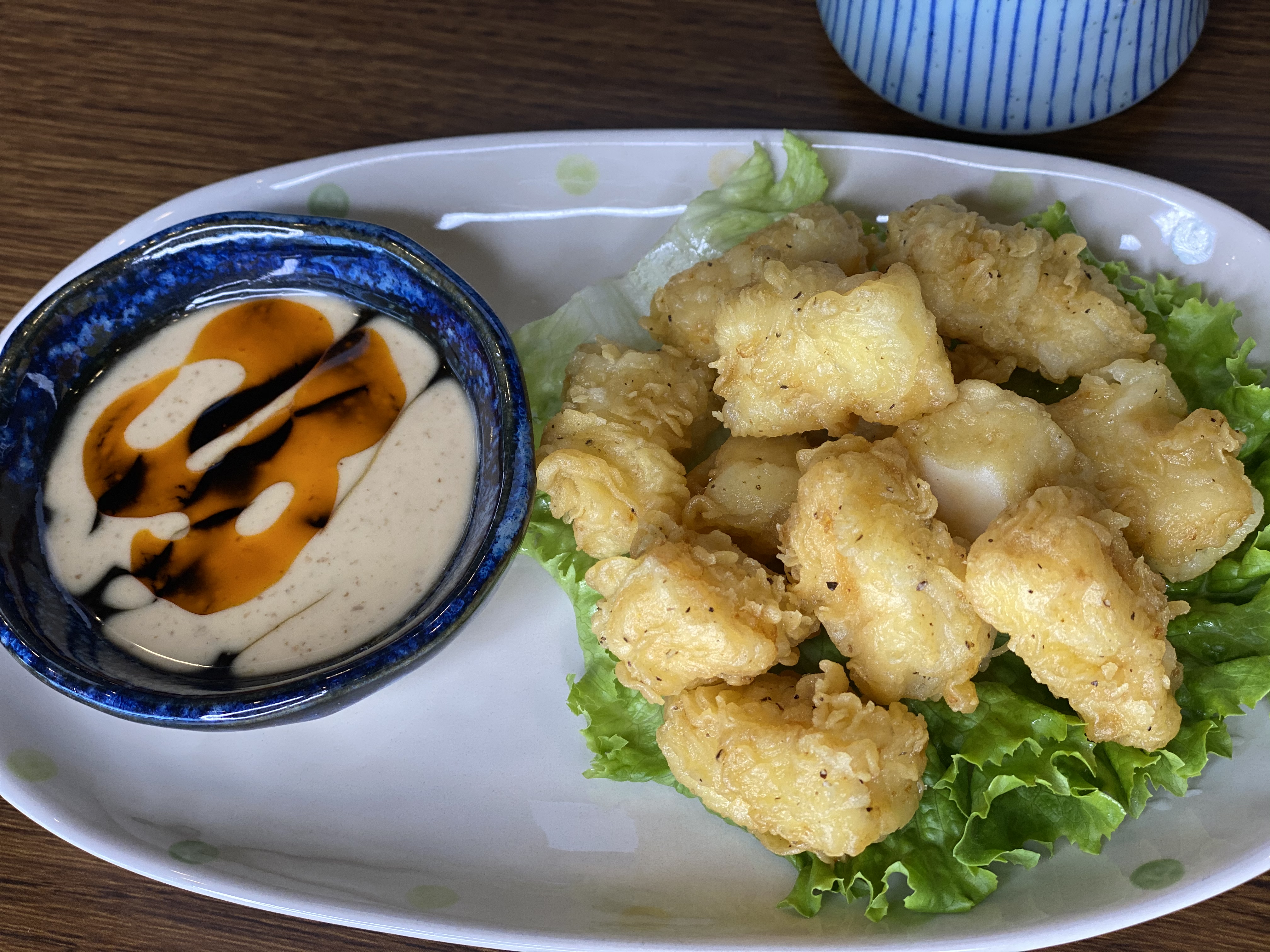 Order Fried Calamari food online from Kome Sushi And Fusion Restaurant store, Garden Grove on bringmethat.com