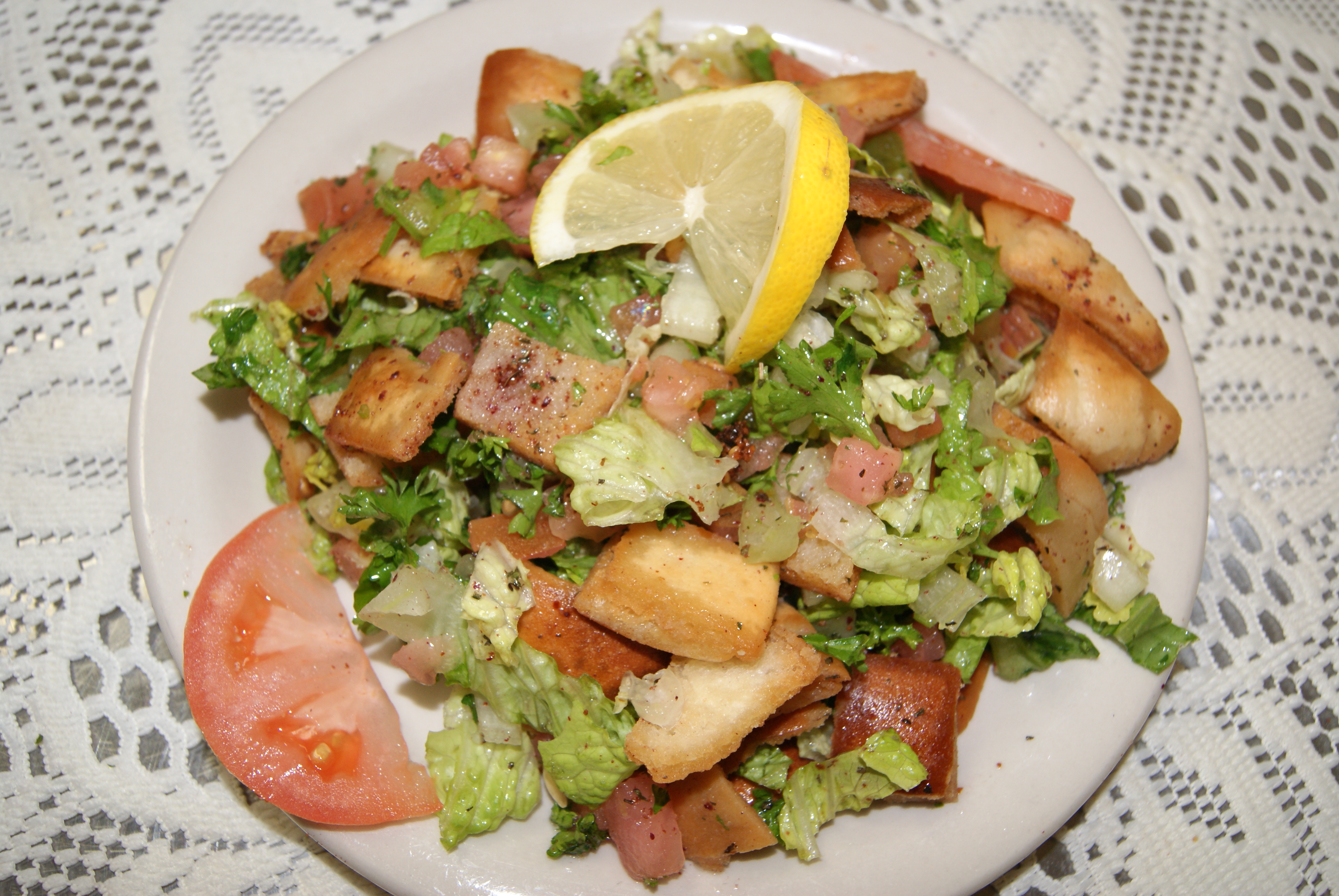Order Greek Salad food online from Mirage Mediterranean* store, Louisville on bringmethat.com