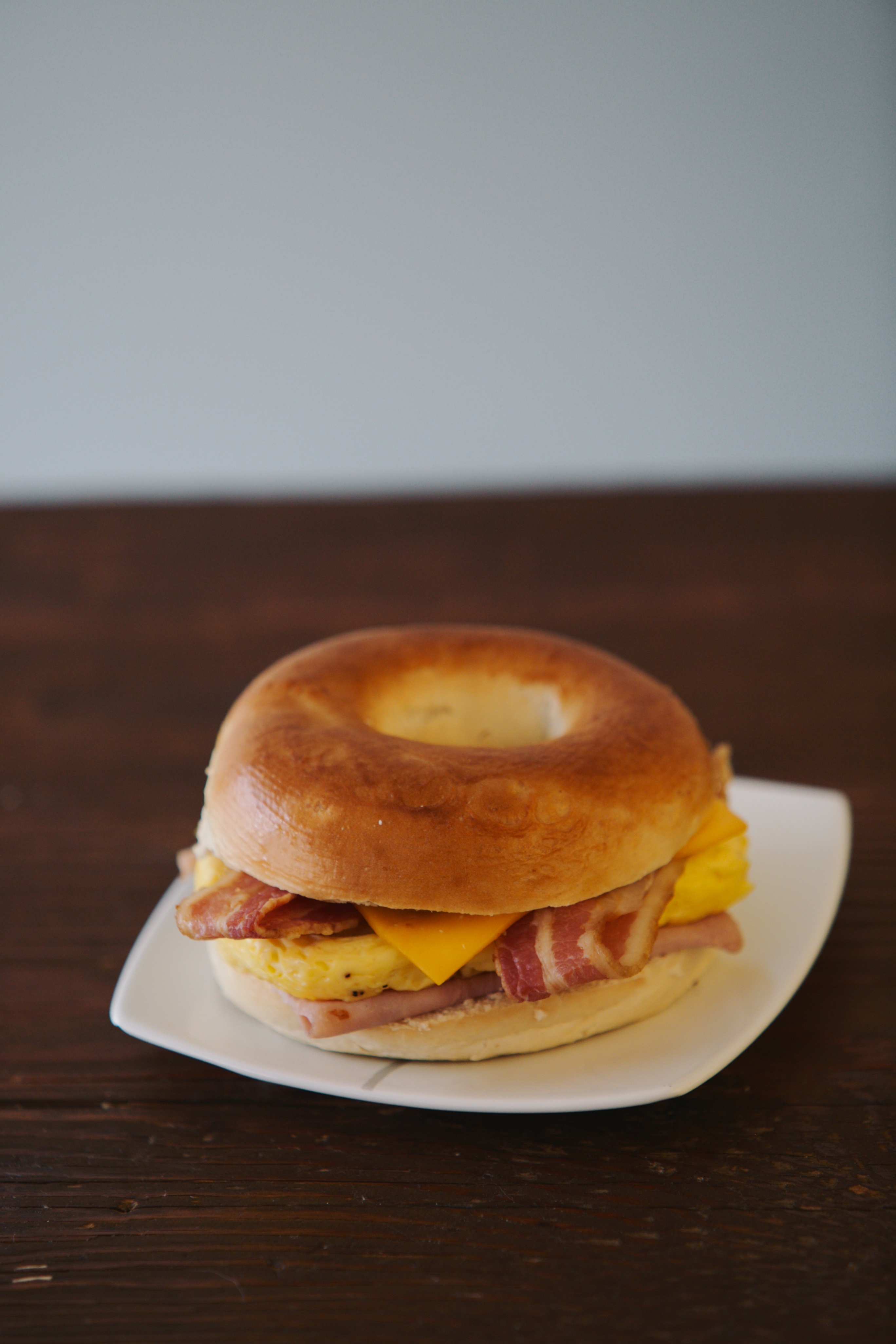 Order Egg, Ham, Bacon and Cheese Bagel food online from Best Donut store, Hermosa Beach on bringmethat.com