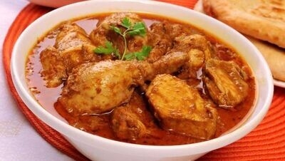 Order Andhra Chicken Curry food online from Peacock Indian Cuisine store, Plano on bringmethat.com