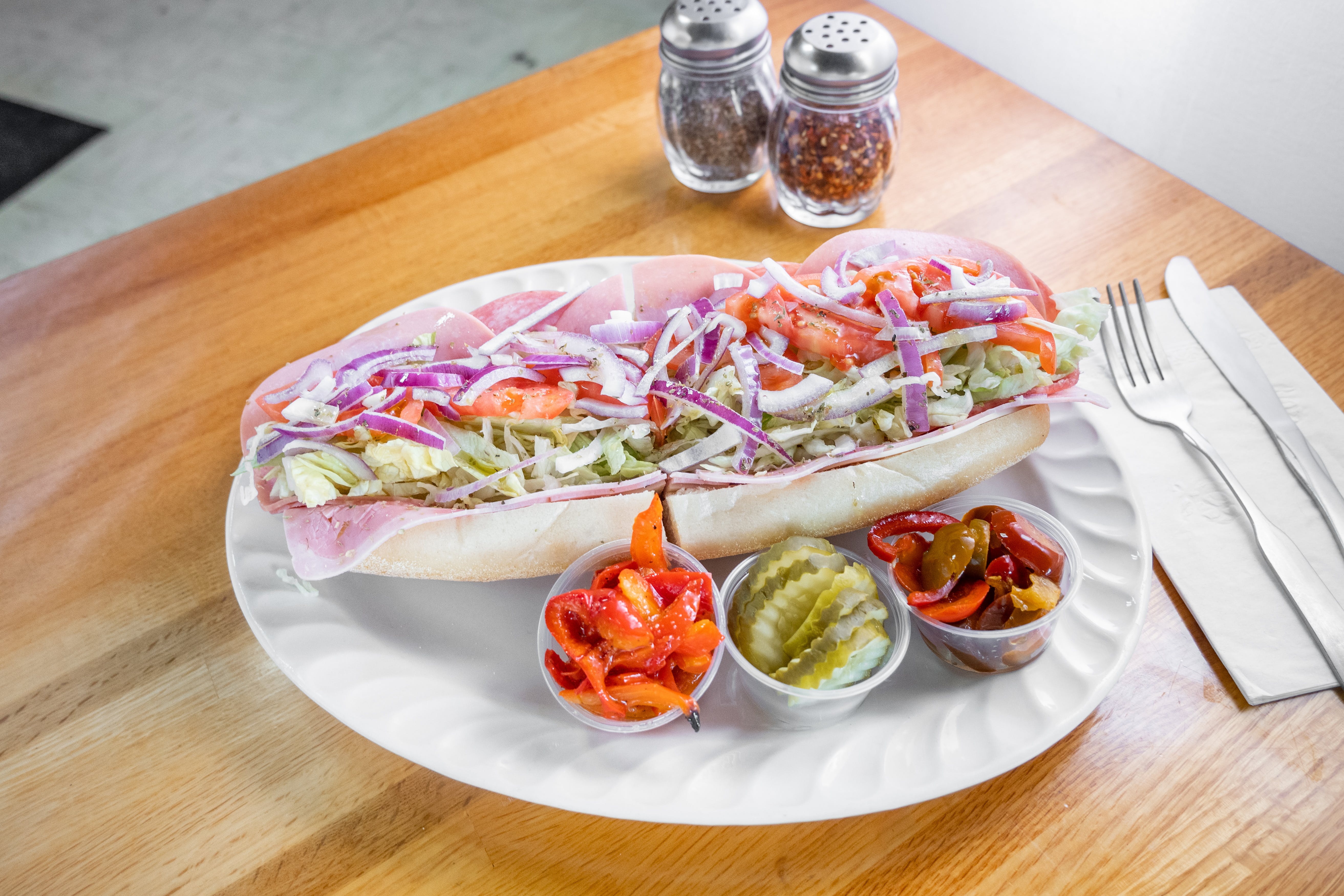 Order Italian Hoagie - 12" food online from Tony's Pizza & Pasta store, Plymouth Meeting on bringmethat.com