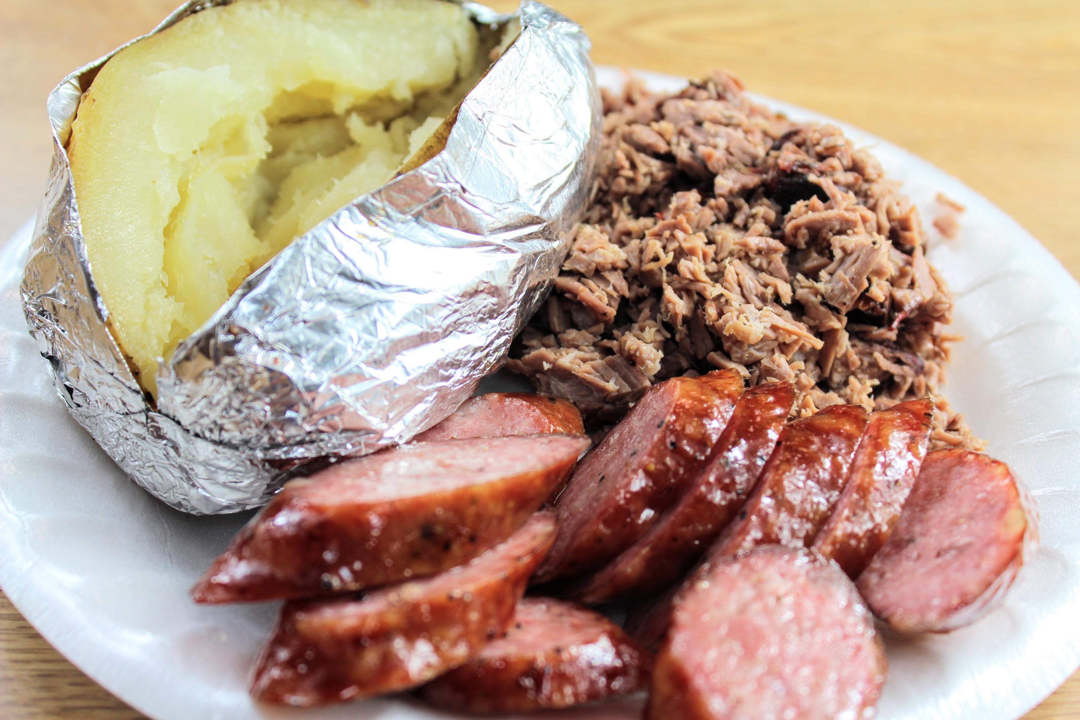 Order Baked Potato with Extra Meat food online from Mckenzie's Barbeque store, Conroe on bringmethat.com