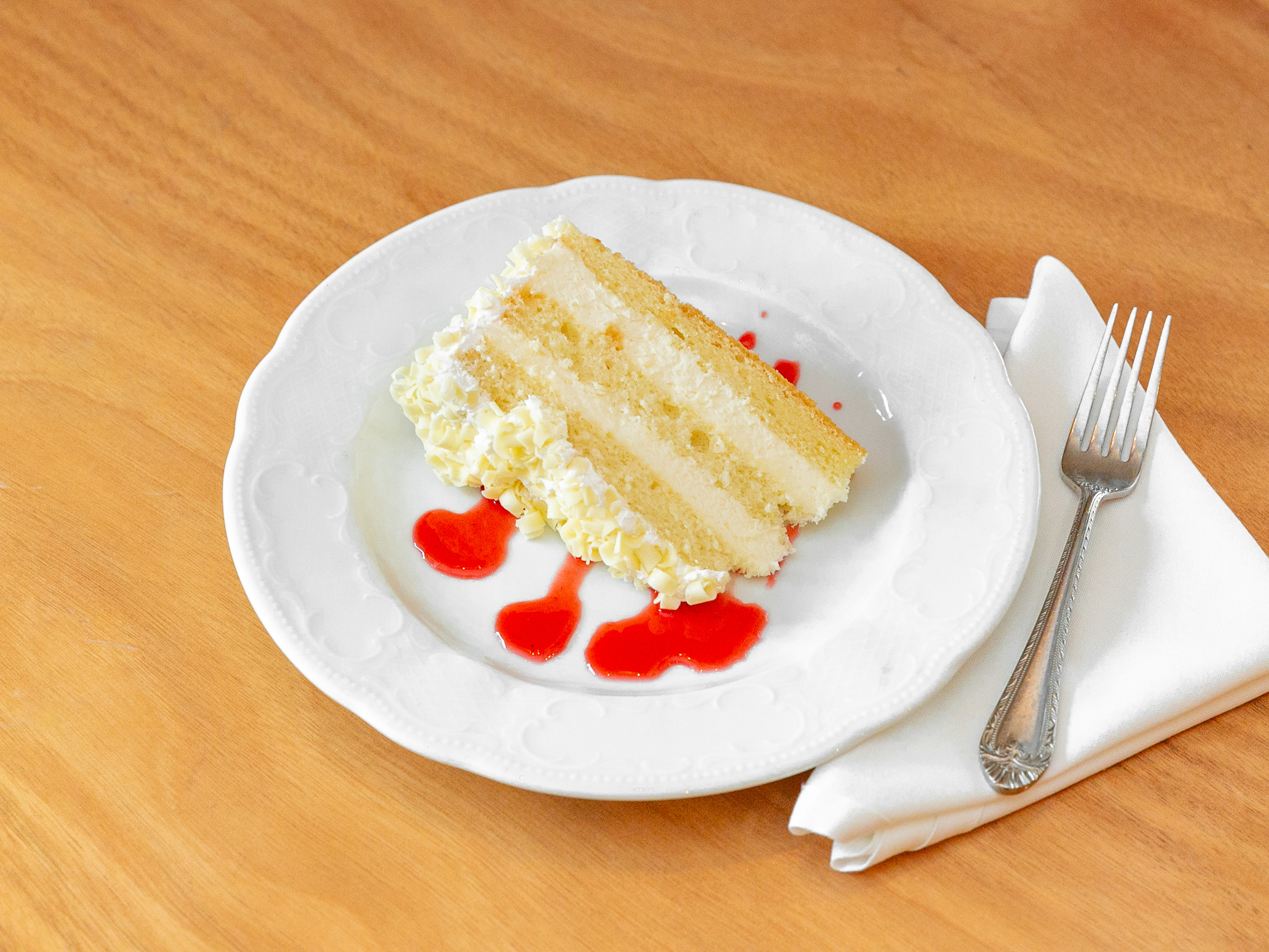 Order White Chocolate Mousse Cake food online from Cafe La Cave store, Des Plaines on bringmethat.com