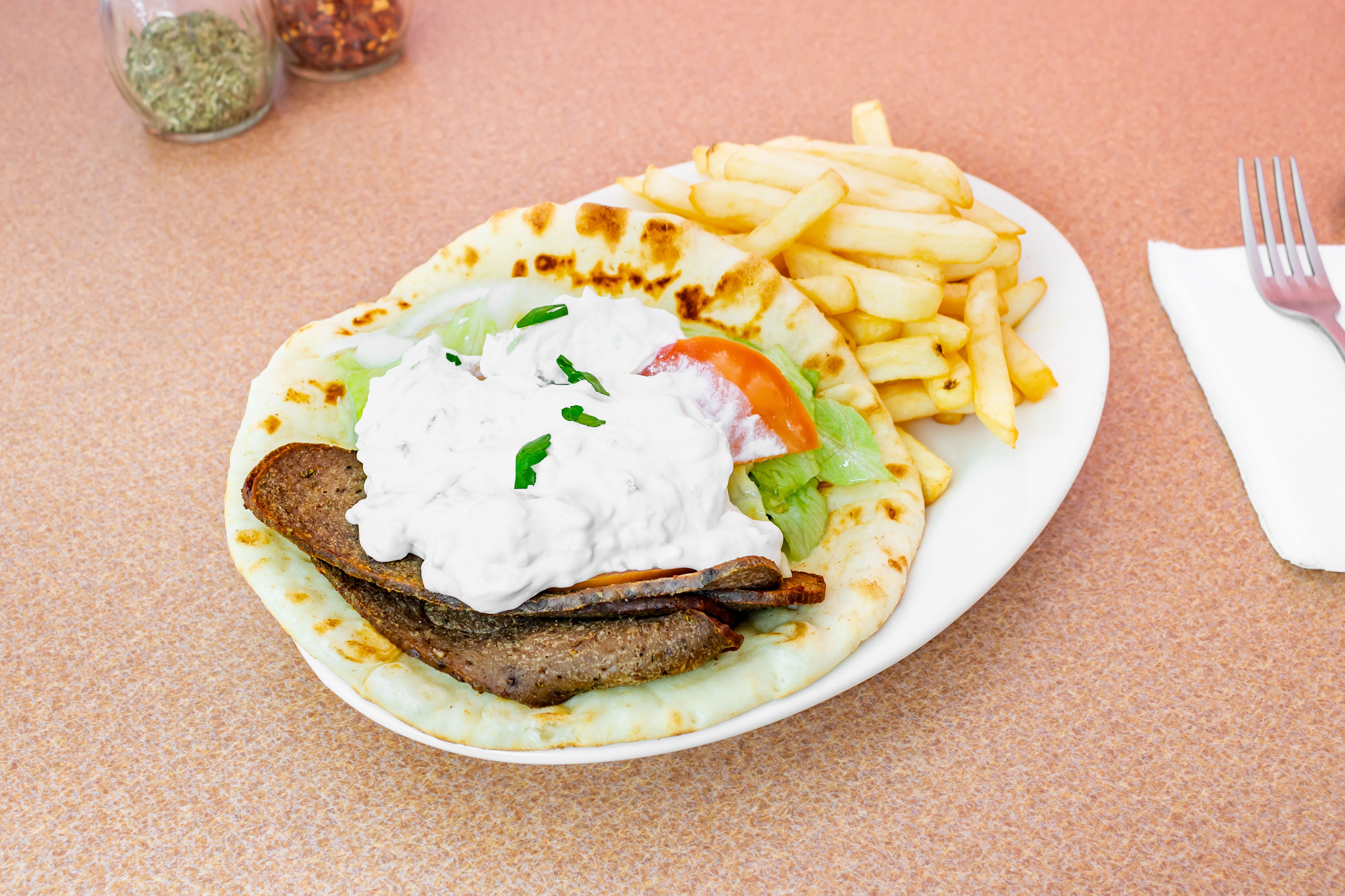 Order Gyro Lamb Deluxe - Gyro food online from I Love NY Pizza store, Yonkers on bringmethat.com