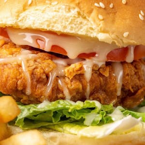 Order 香辣鸡腿堡 Spicy Chicken Burger 大辣 food online from Yiukee Hong Kong Tea Station store, City Of Industry on bringmethat.com