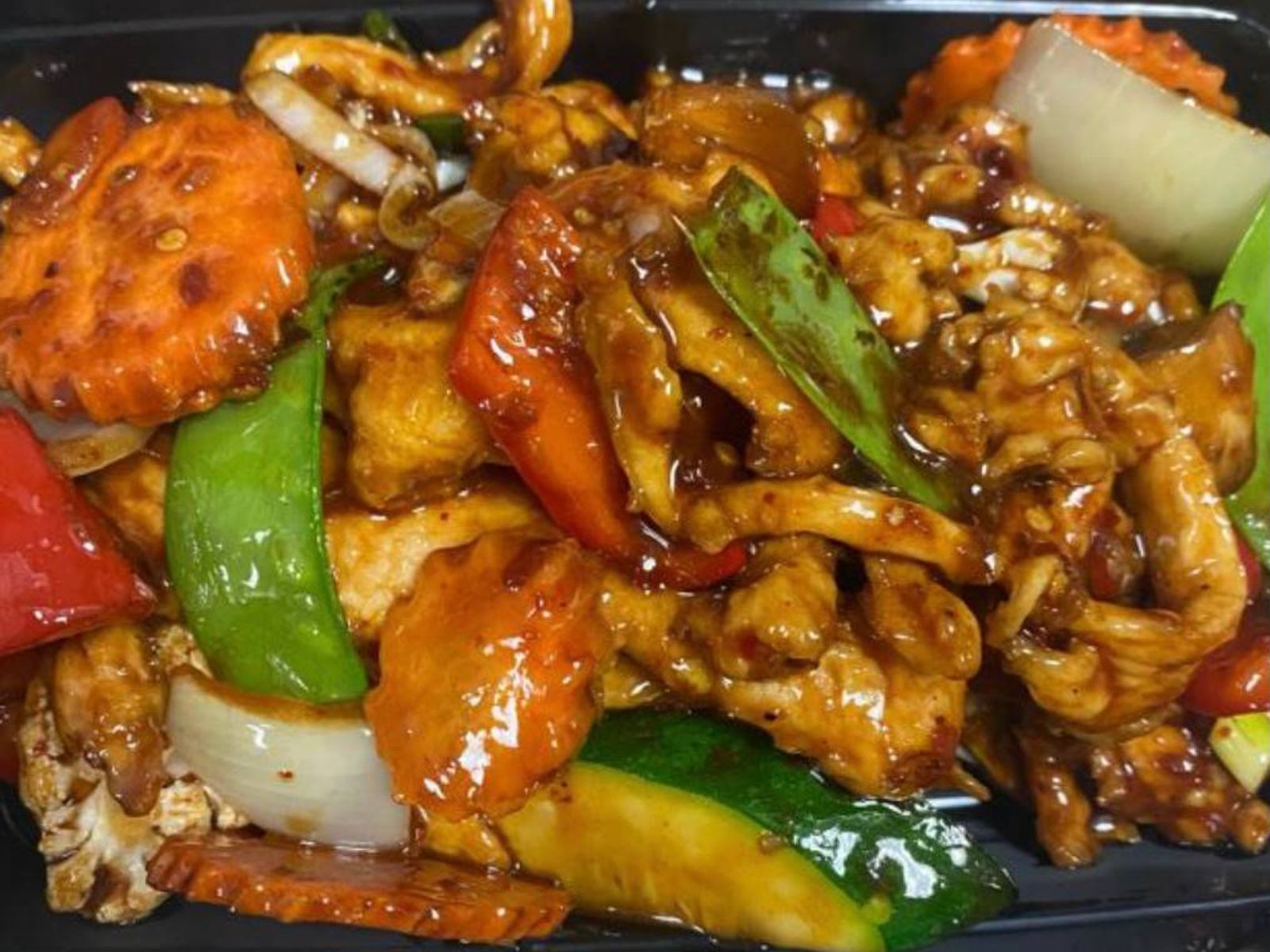 Order Hunan Chicken food online from Rice Bowl Cafe store, Austin on bringmethat.com