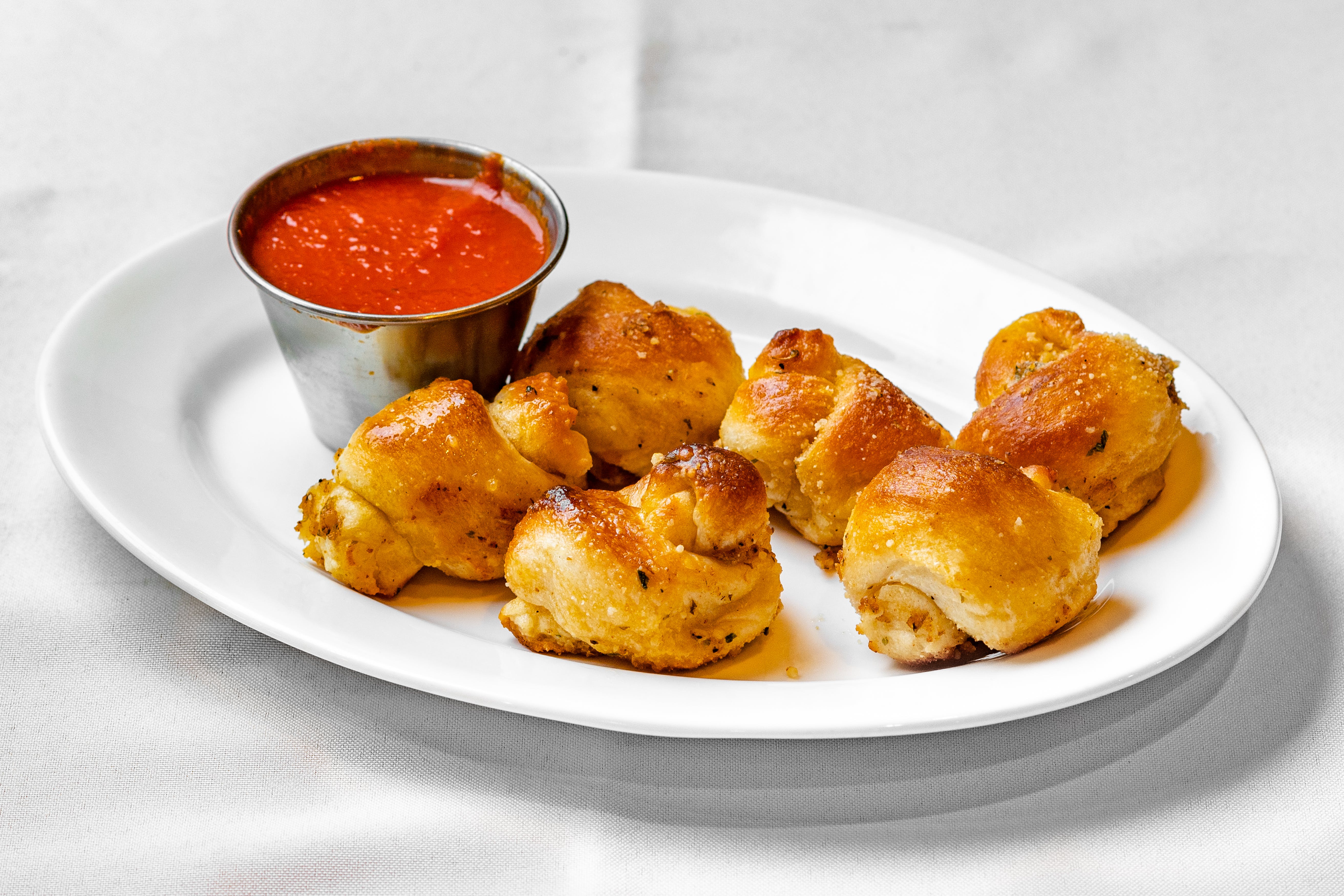Order Garlic Knots - 6 Pieces food online from Angelina Trattoria store, Florham Park on bringmethat.com