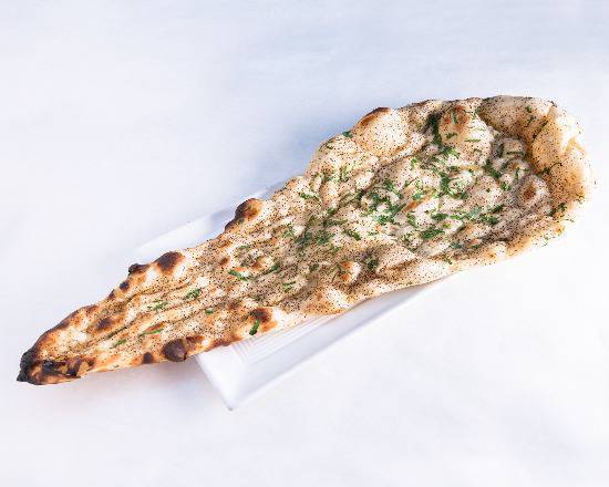 Order Black Pepper Cilantro Naan food online from Gaylord India Restaurant store, Chicago on bringmethat.com
