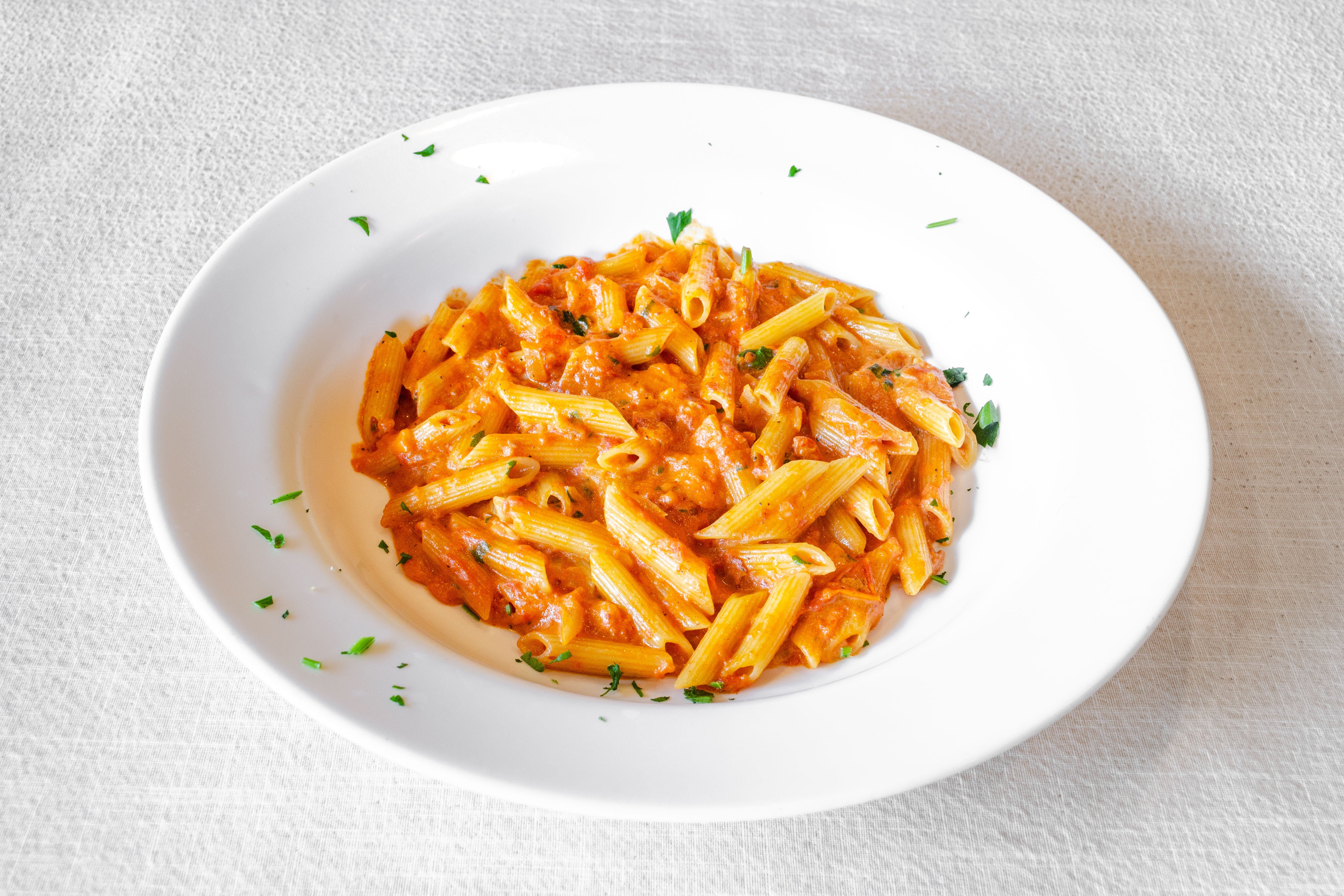 Order Pasta with Vodka Sauce - Pasta food online from Puzo's Family Restaurant store, Ridgewood on bringmethat.com