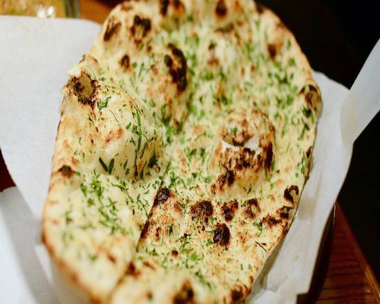 Order Garlic Naan food online from Incredible India Cafe store, Los Angeles on bringmethat.com