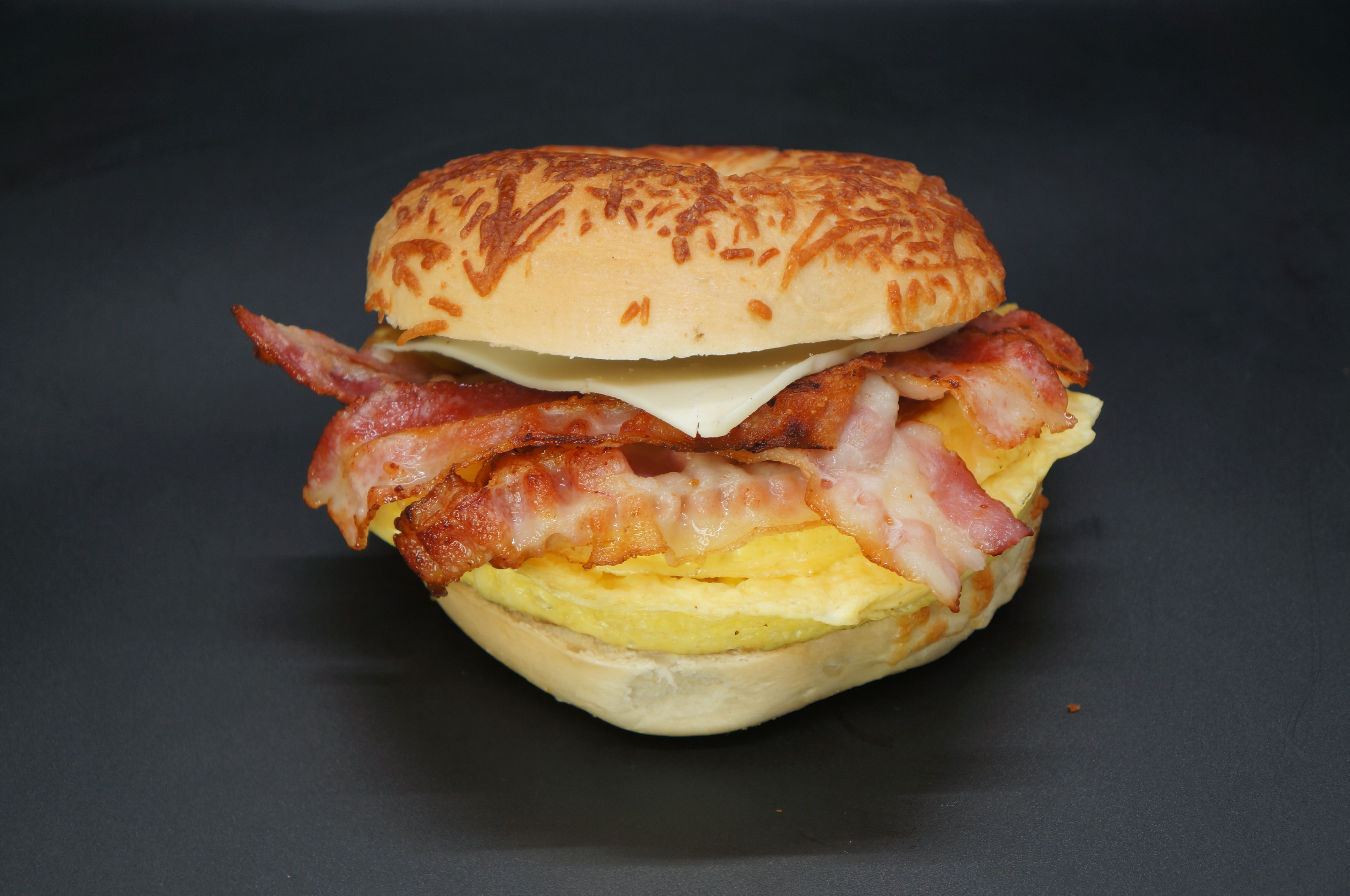 Order Bacon and Egg Cheese Sandwich food online from Fortissimo Coffee House store, Worcester on bringmethat.com