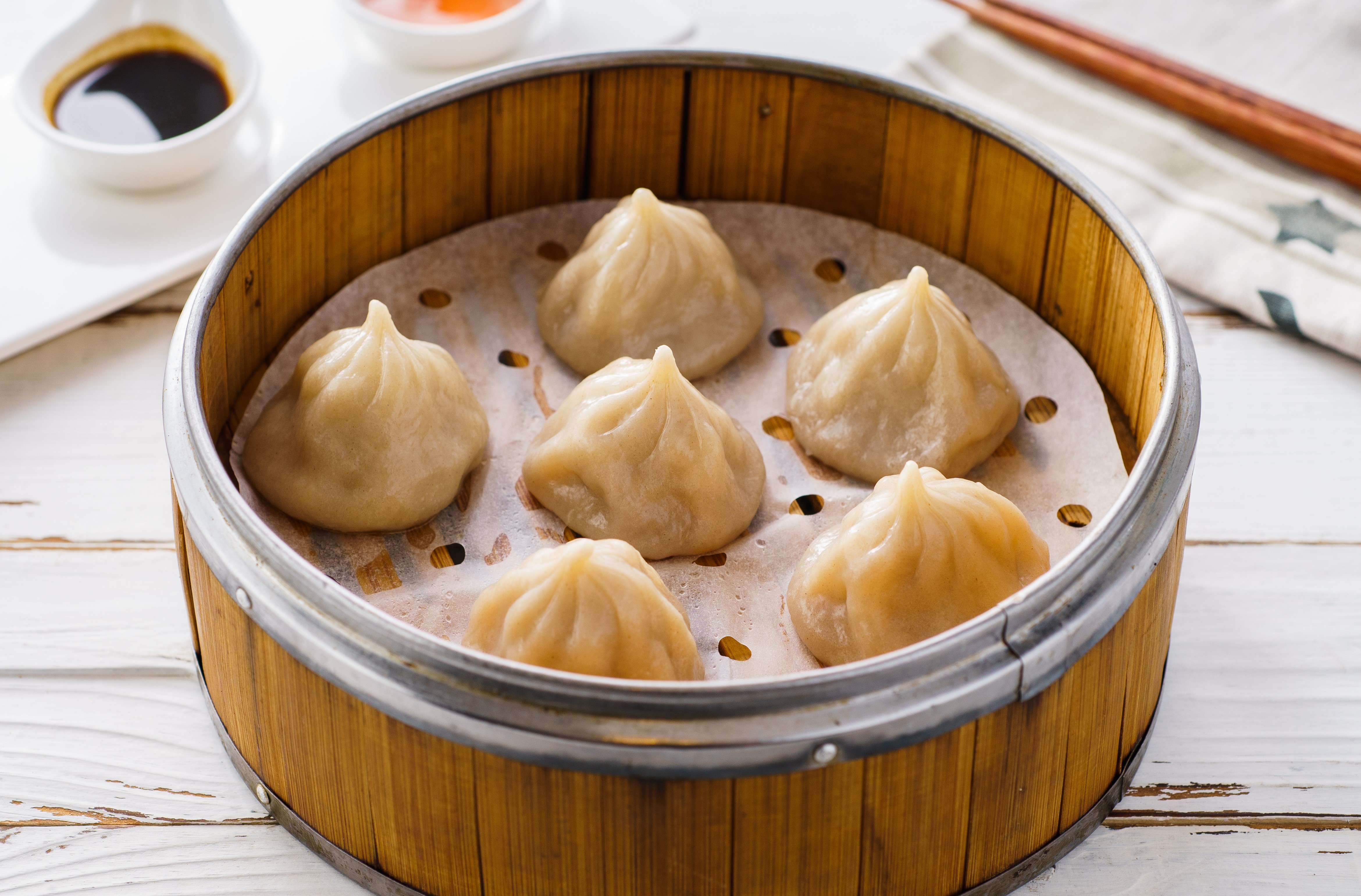 Order Soup Dumplings 小笼包 food online from Sichuan hot pot cuisine store, New York on bringmethat.com