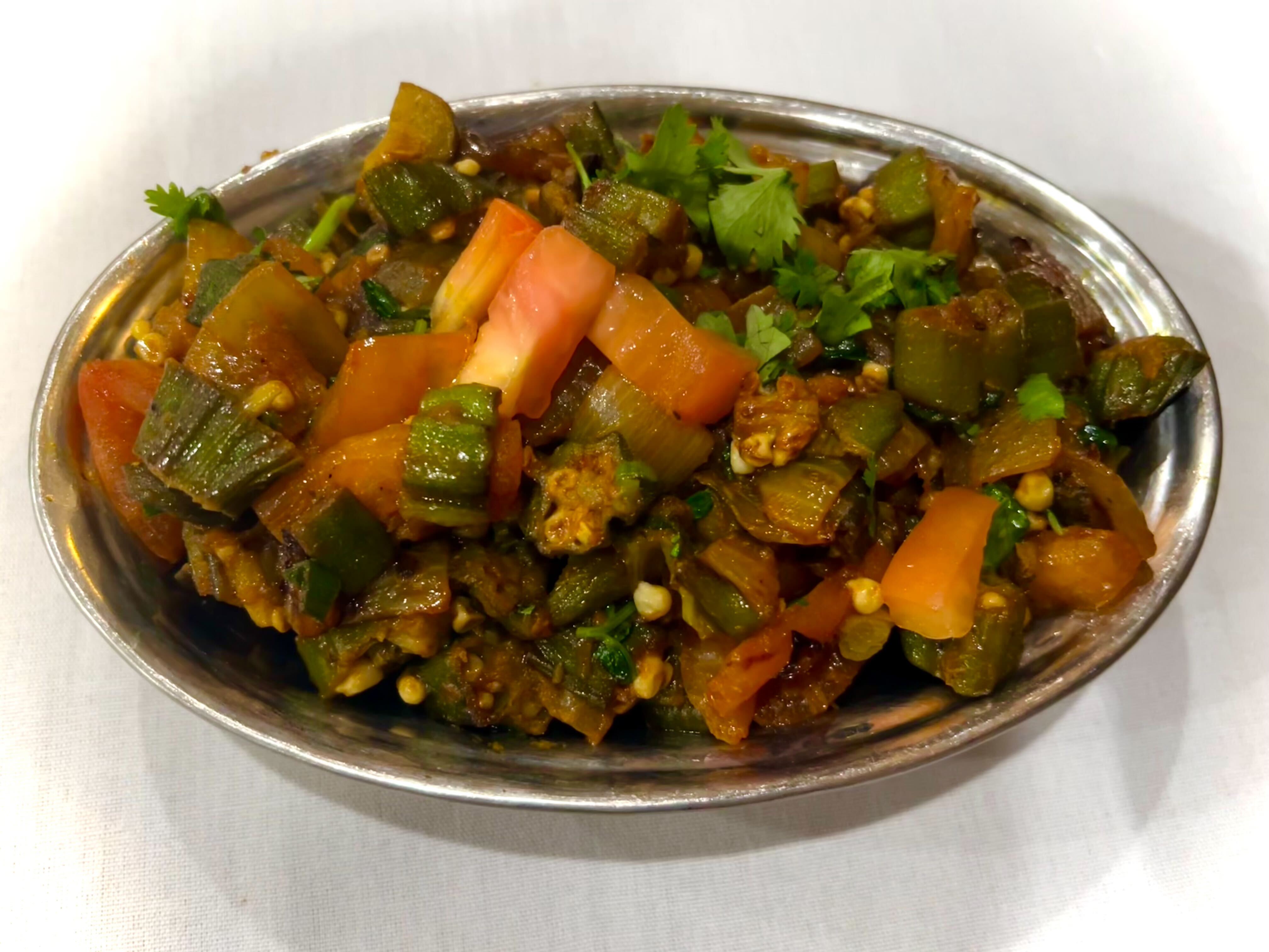 Order Okra Masala food online from Himalayan flavors store, Berkeley on bringmethat.com