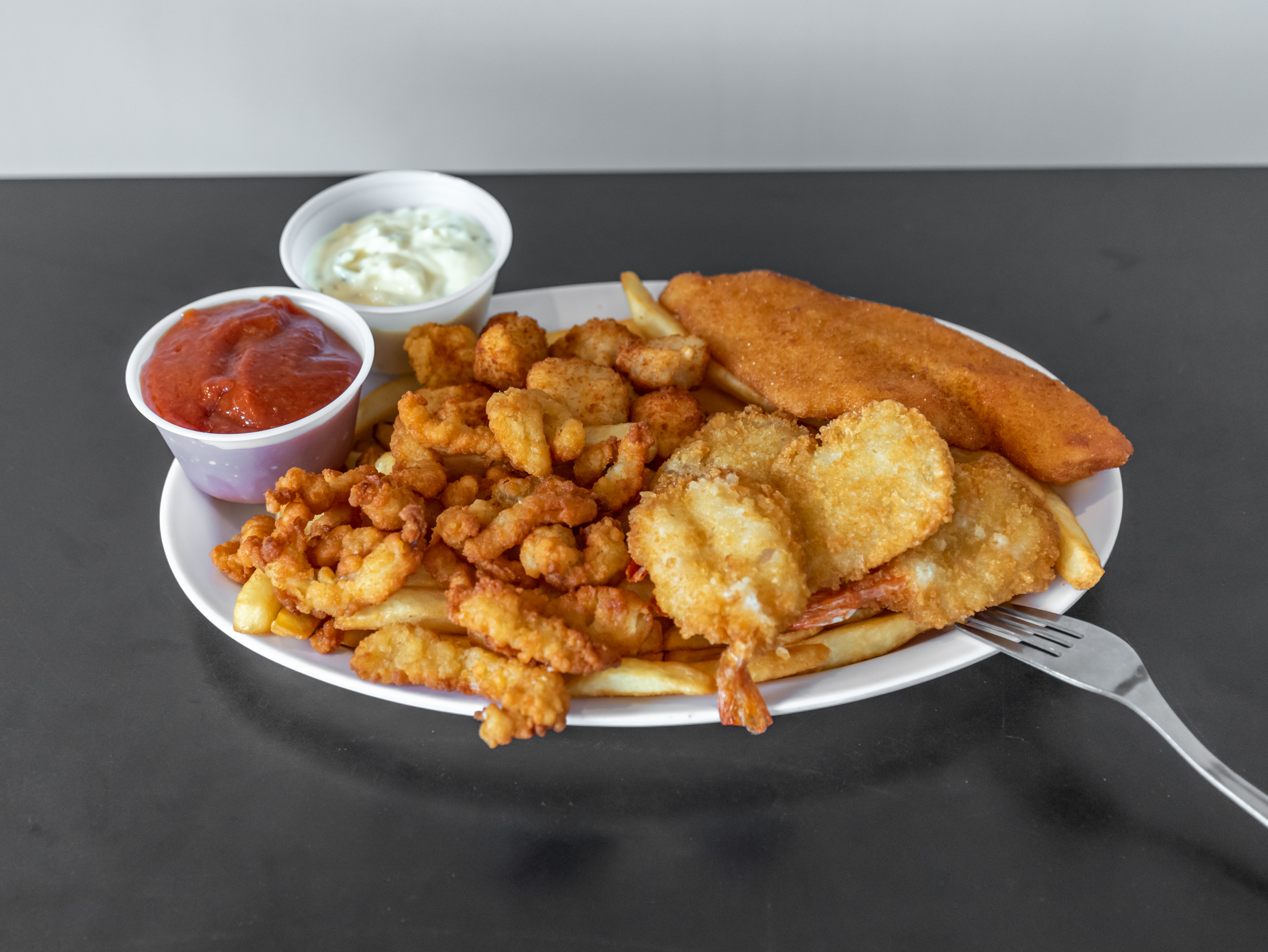 Order Seafood Combo food online from Mikes Pizzeria store, Manchester on bringmethat.com