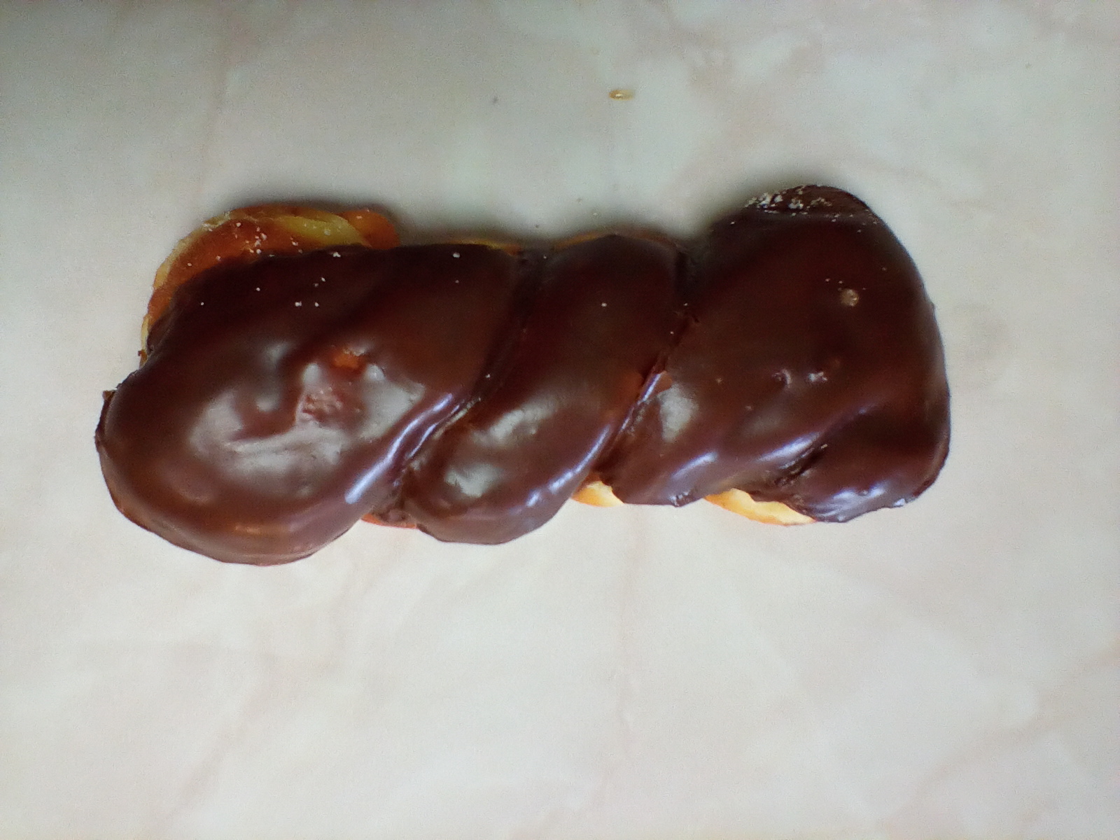 Order Chocolate Twist food online from Kenny Donuts store, Corona on bringmethat.com