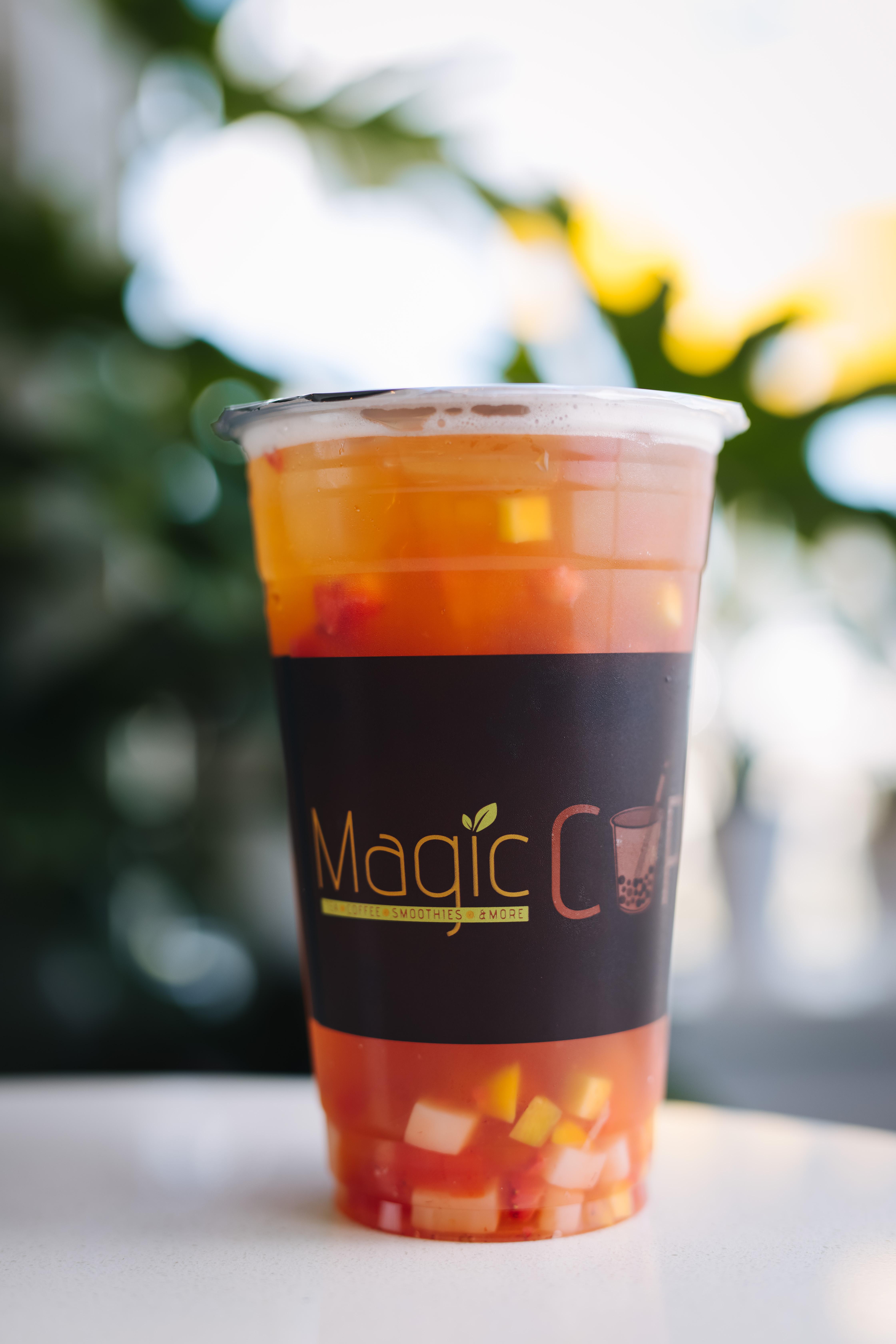 Order Iced Fruit Tea Madness food online from Magic Cup store, Houston on bringmethat.com