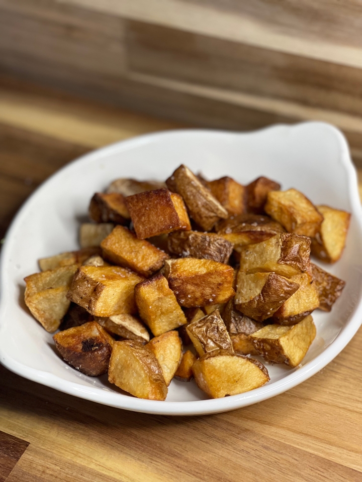 Order Roasted Potatoes food online from Urban American Kitchen store, Houston on bringmethat.com