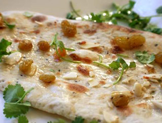 Order Kashmiri Naan food online from Gourmet India store, Houston on bringmethat.com