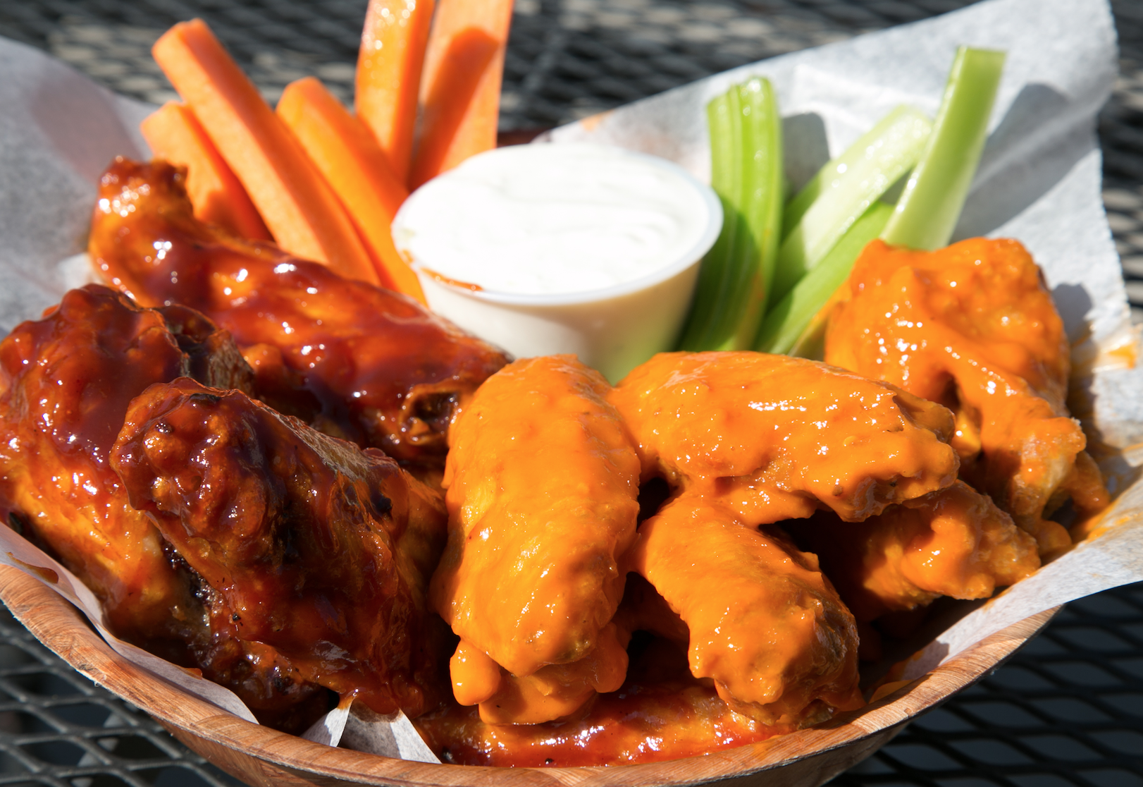 Order 50 Bourbon Glazed Wings - Platter food online from Branded Saloon Catering store, Brooklyn on bringmethat.com