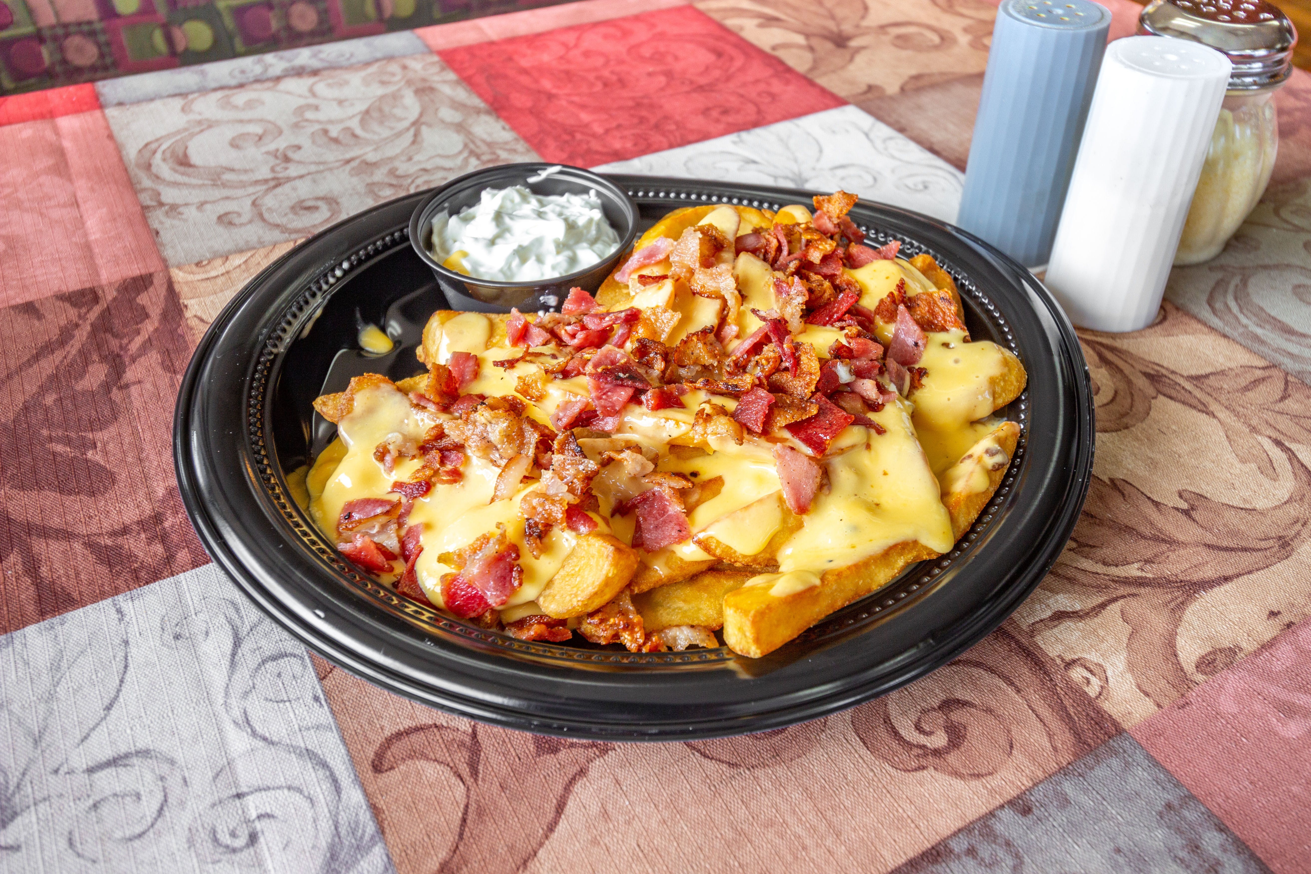 Order Loaded Fries - 1 lb. food online from Chick-N-Pizza Works store, Buffalo on bringmethat.com