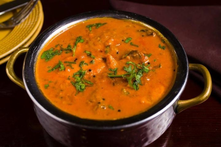 Order Patiala Fish Curry food online from Dhaba indian cuisine store, New York on bringmethat.com