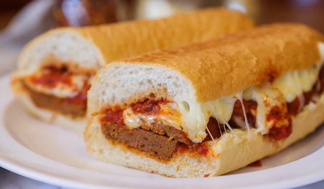 Order Meatball Parmigiana Sandwich - 9" food online from Massimo Pizzeria store, Southampton on bringmethat.com